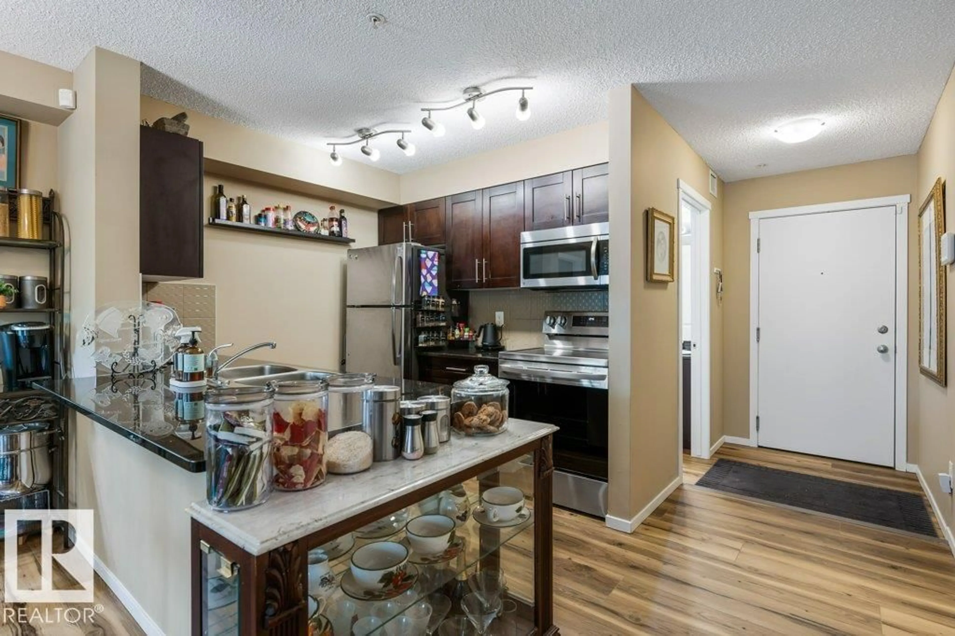 Standard kitchen, wood/laminate floor for #107 - 25 ELEMENT DR, St. Albert Alberta T8N7S1