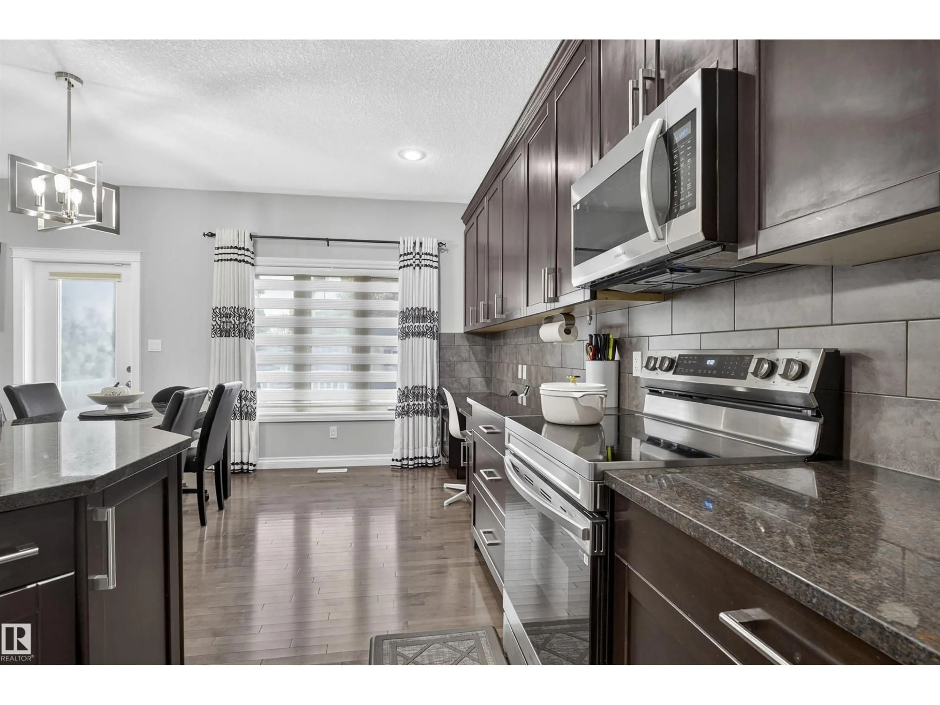 Open concept kitchen, ceramic/tile floor for 618 ADAMS WY, Edmonton Alberta T6W0J9