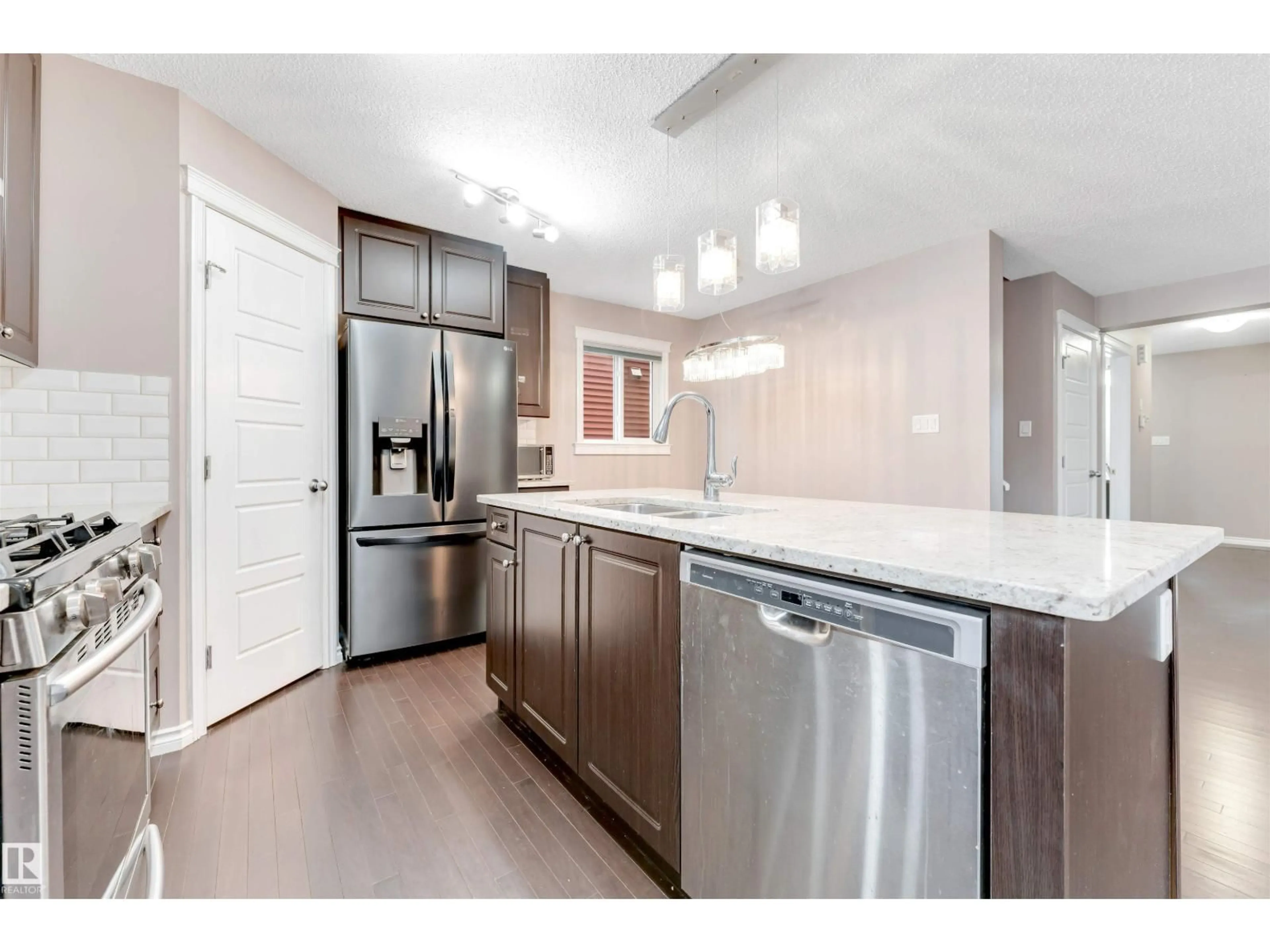 Open concept kitchen, unknown for 245 EBBERS BV, Edmonton Alberta T5Y1R8