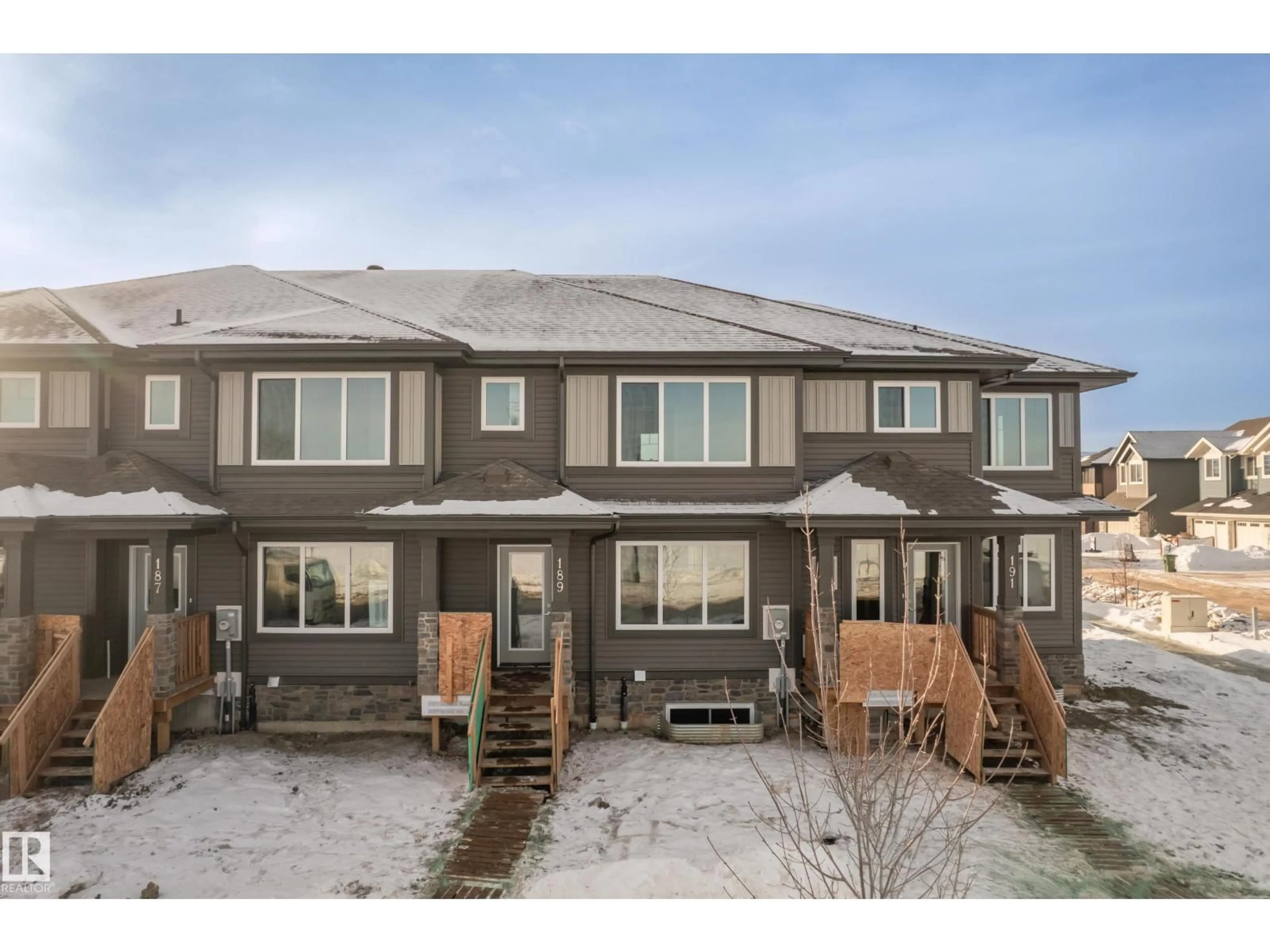 A pic from outside/outdoor area/front of a property/back of a property/a pic from drone, street for 189 GRIESBACH RD, Edmonton Alberta T5E6Z9