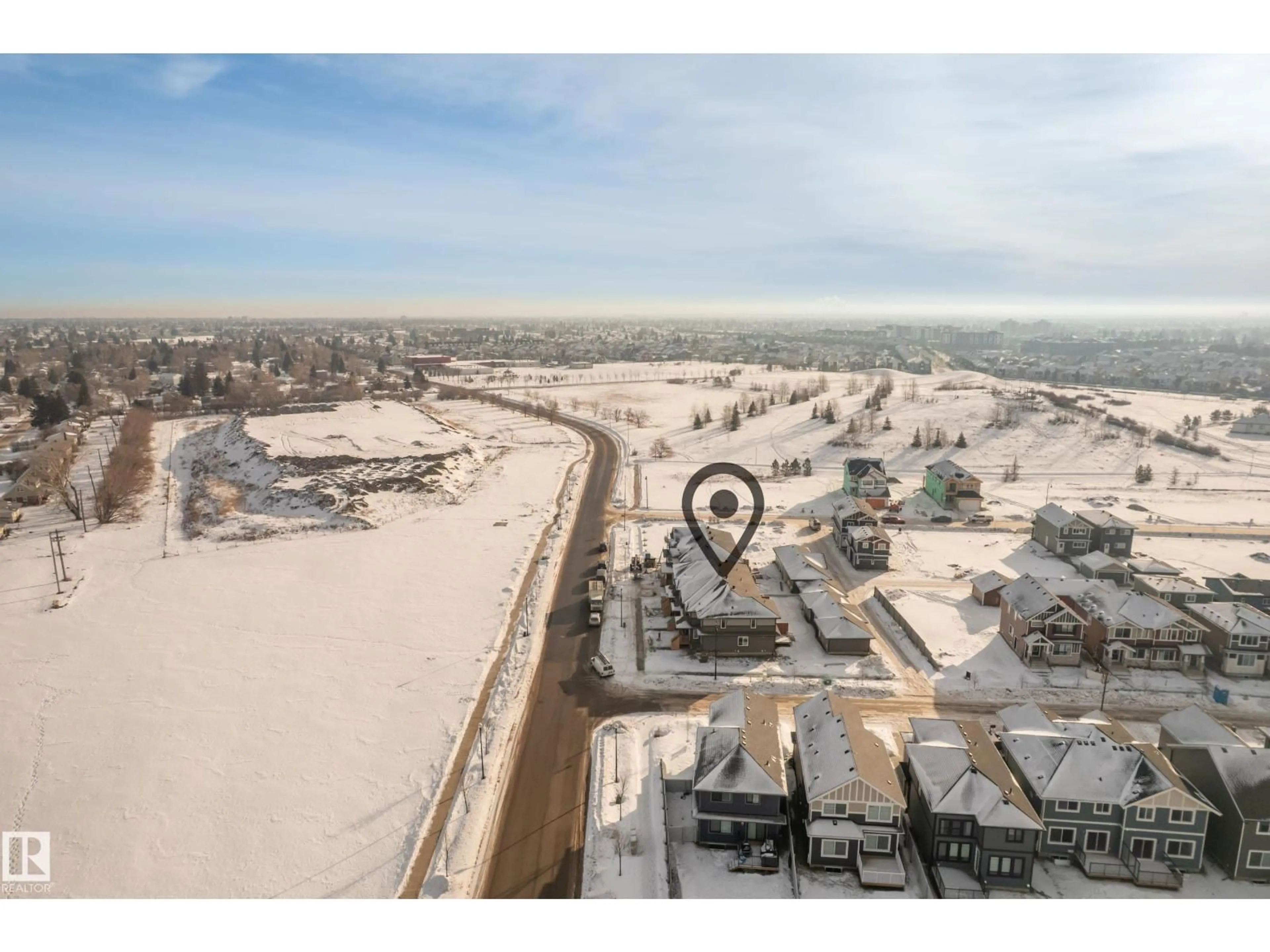 A pic from outside/outdoor area/front of a property/back of a property/a pic from drone, unknown for 189 GRIESBACH RD, Edmonton Alberta T5E6Z9