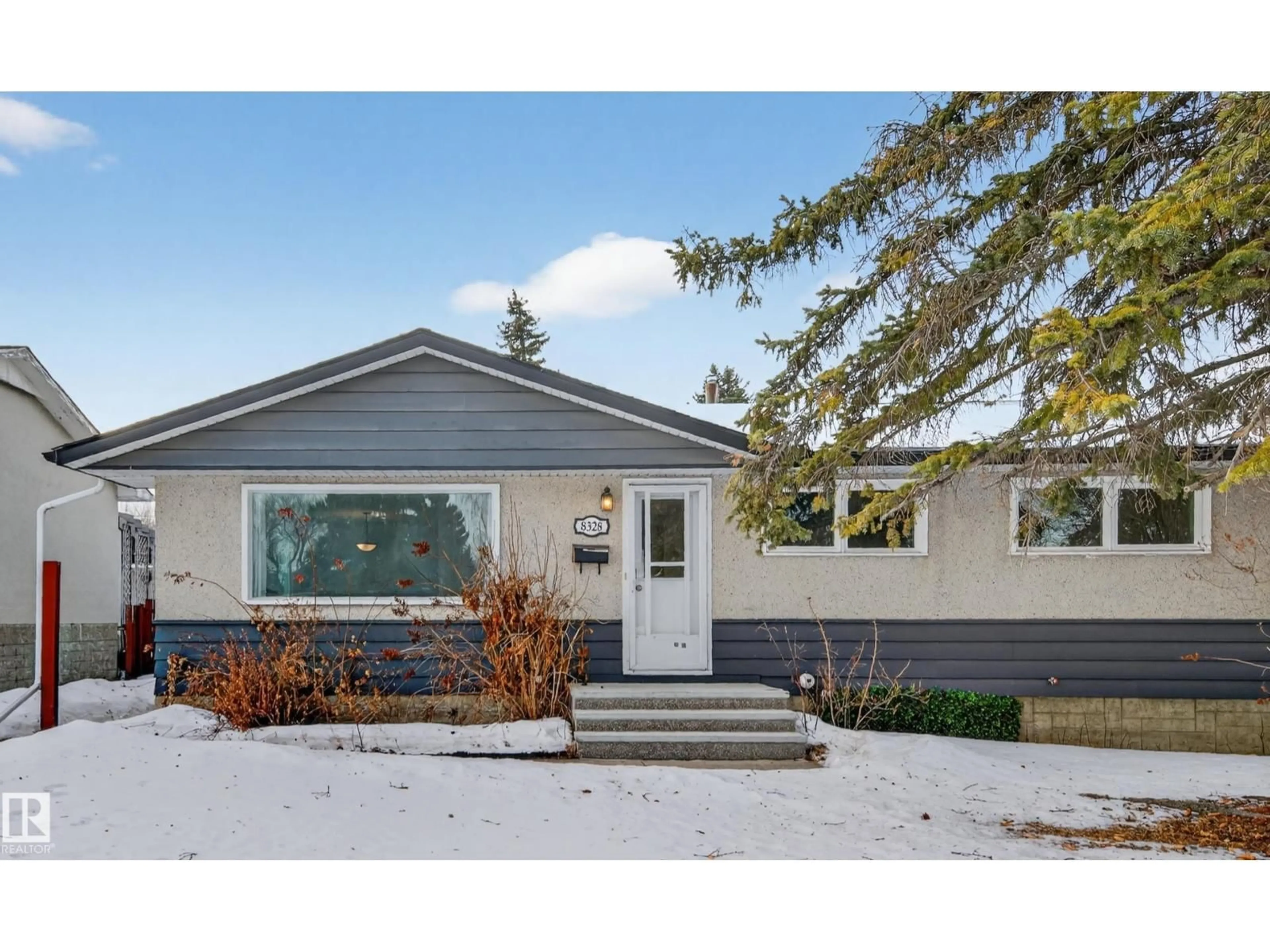 Home with vinyl exterior material, street for 8328 164 ST, Edmonton Alberta T5R2P8
