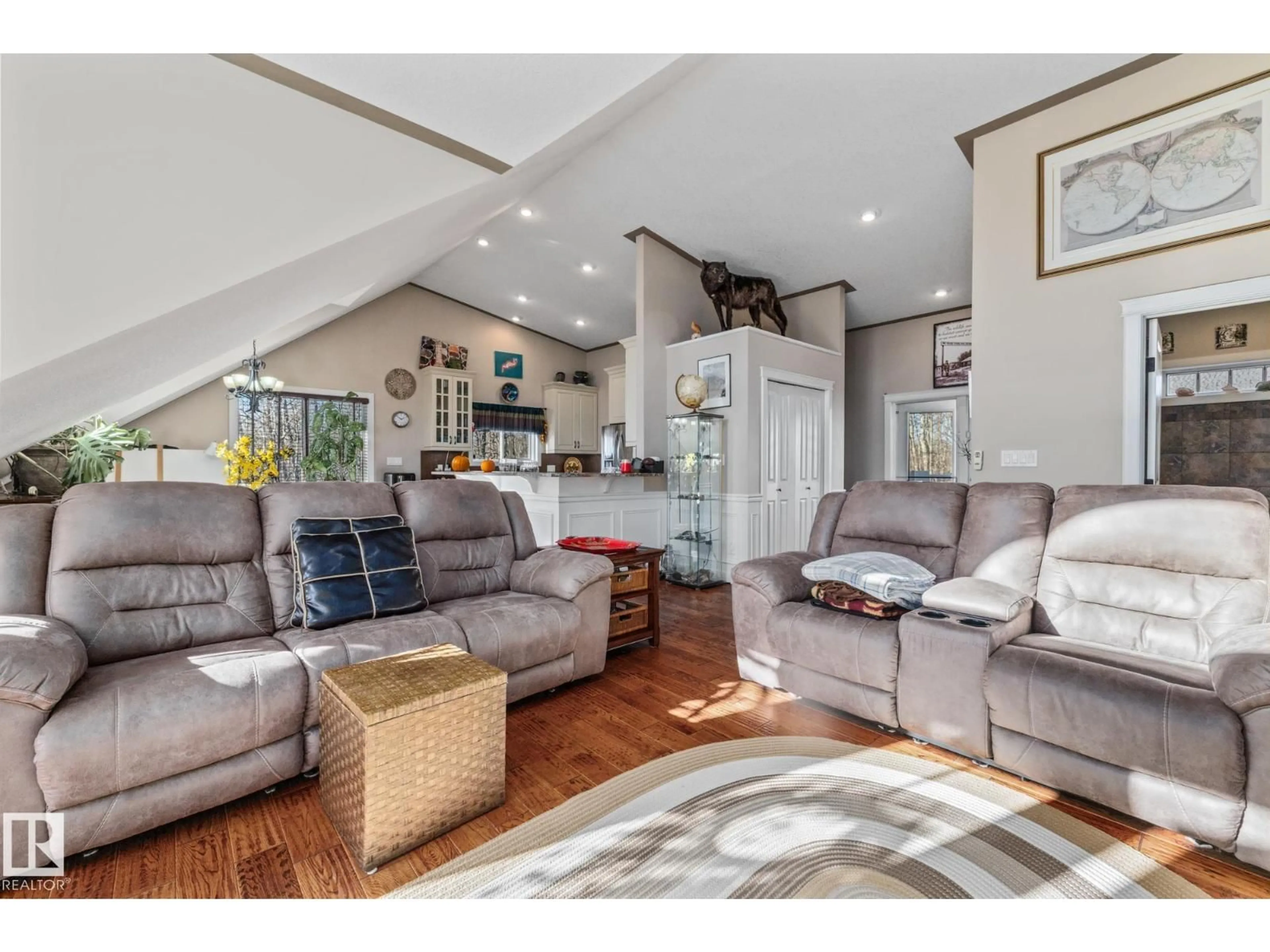 Living room with furniture, wood/laminate floor for 53320 - 231 RGE ROAD 30, Rural Parkland County Alberta T7Y0E2