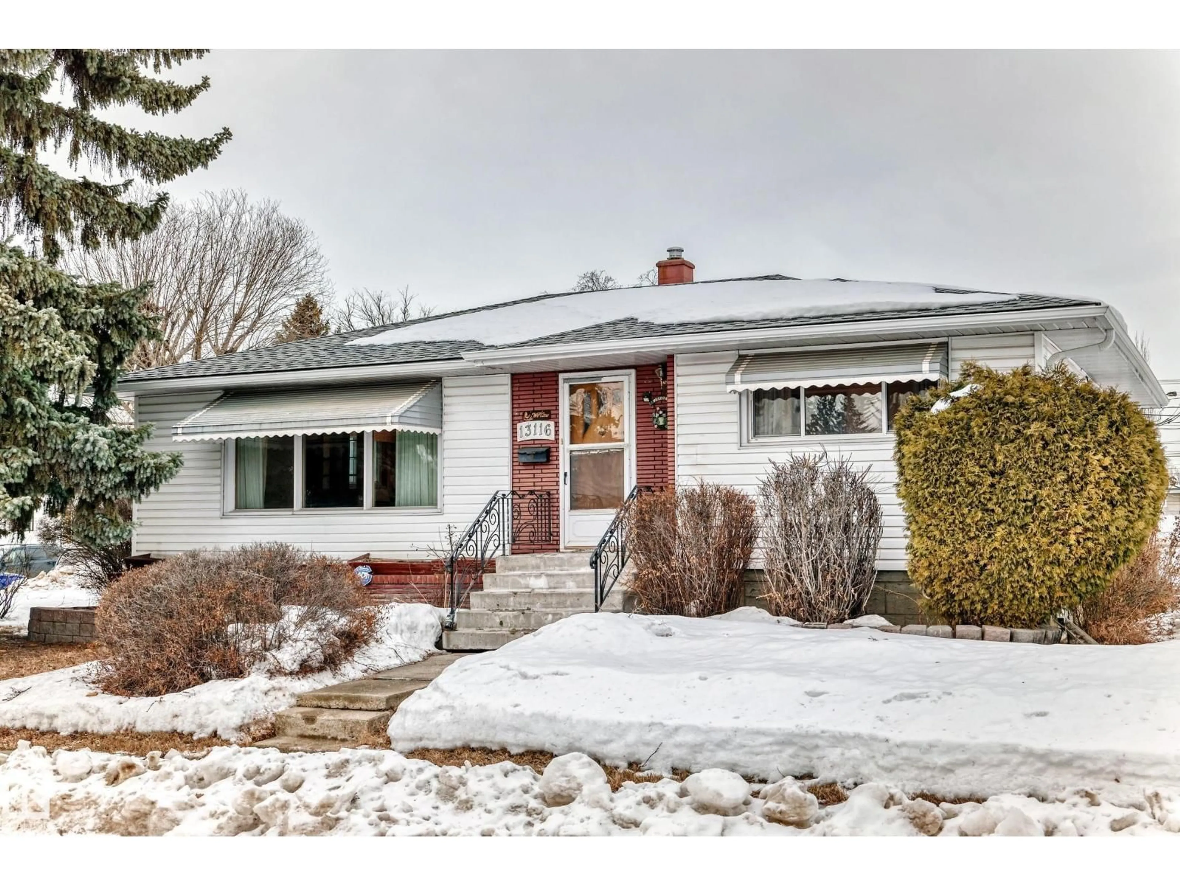 Home with brick exterior material, street for 13116 128A AV, Edmonton Alberta T5L3H9