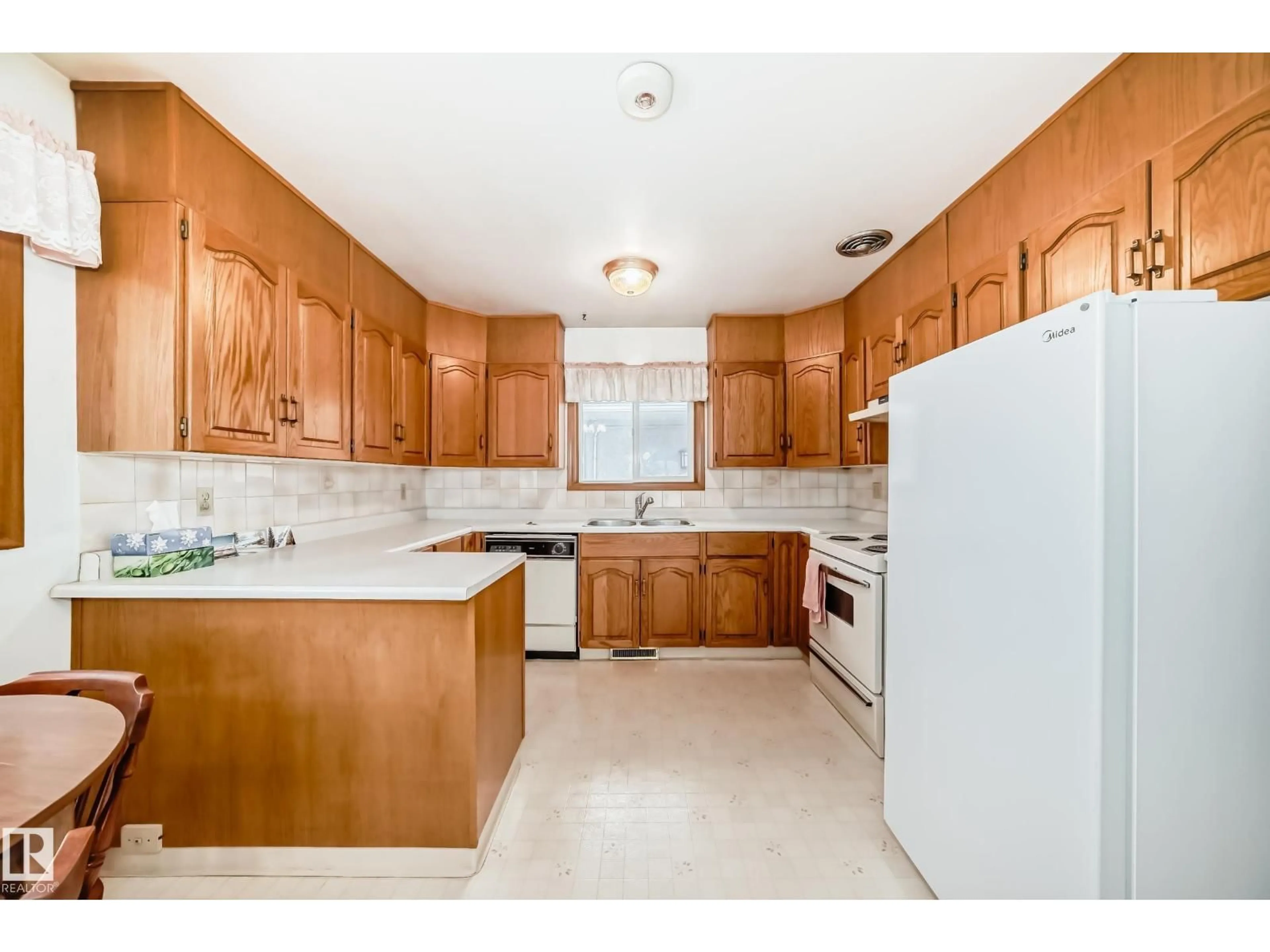 Standard kitchen, ceramic/tile floor for 13116 128A AV, Edmonton Alberta T5L3H9