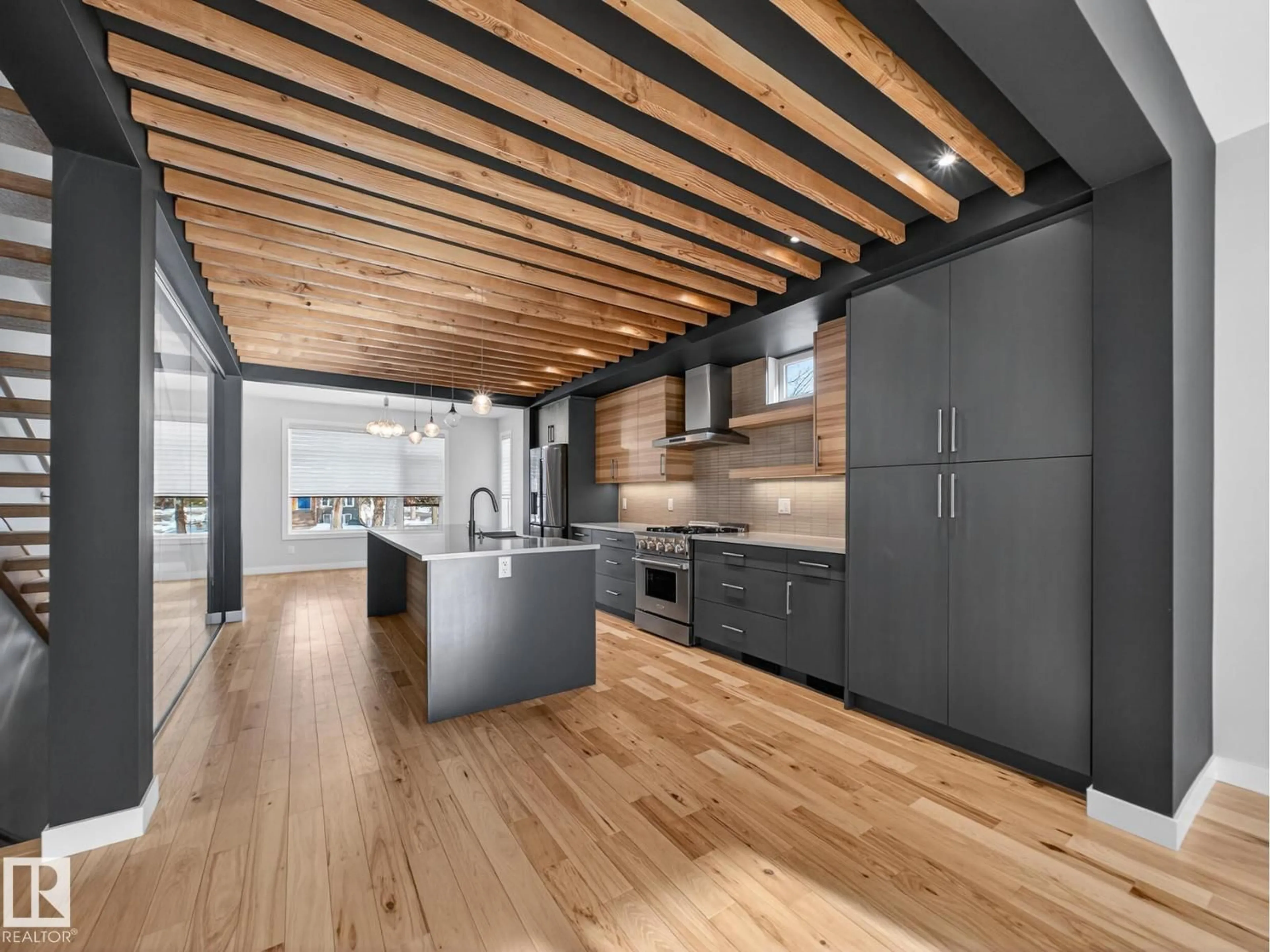 Open concept kitchen, wood/laminate floor for 9803 74 AV, Edmonton Alberta T6E1G1