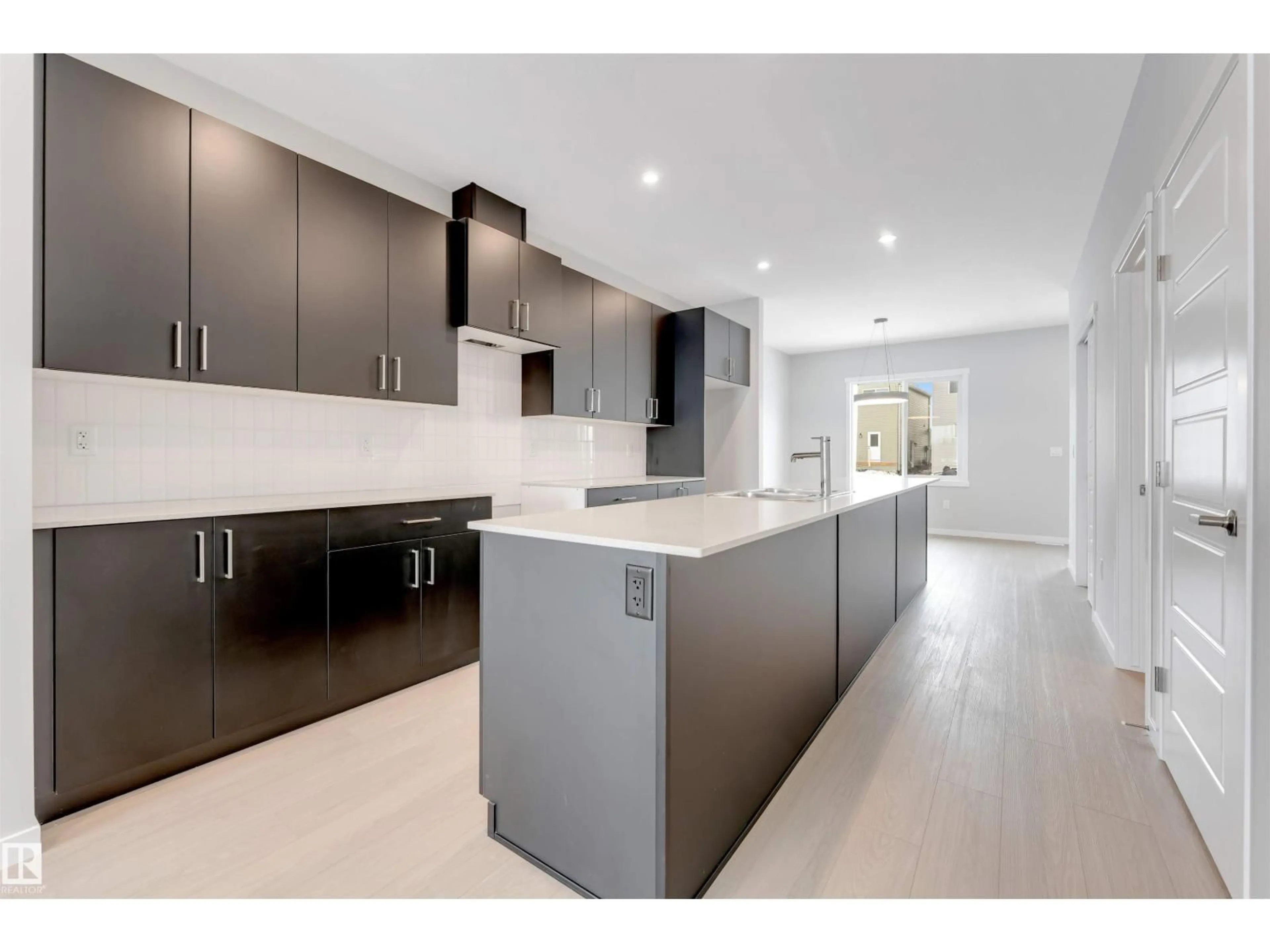 Open concept kitchen, ceramic/tile floor for 1027 ASTER BV, Edmonton Alberta T6T2W7