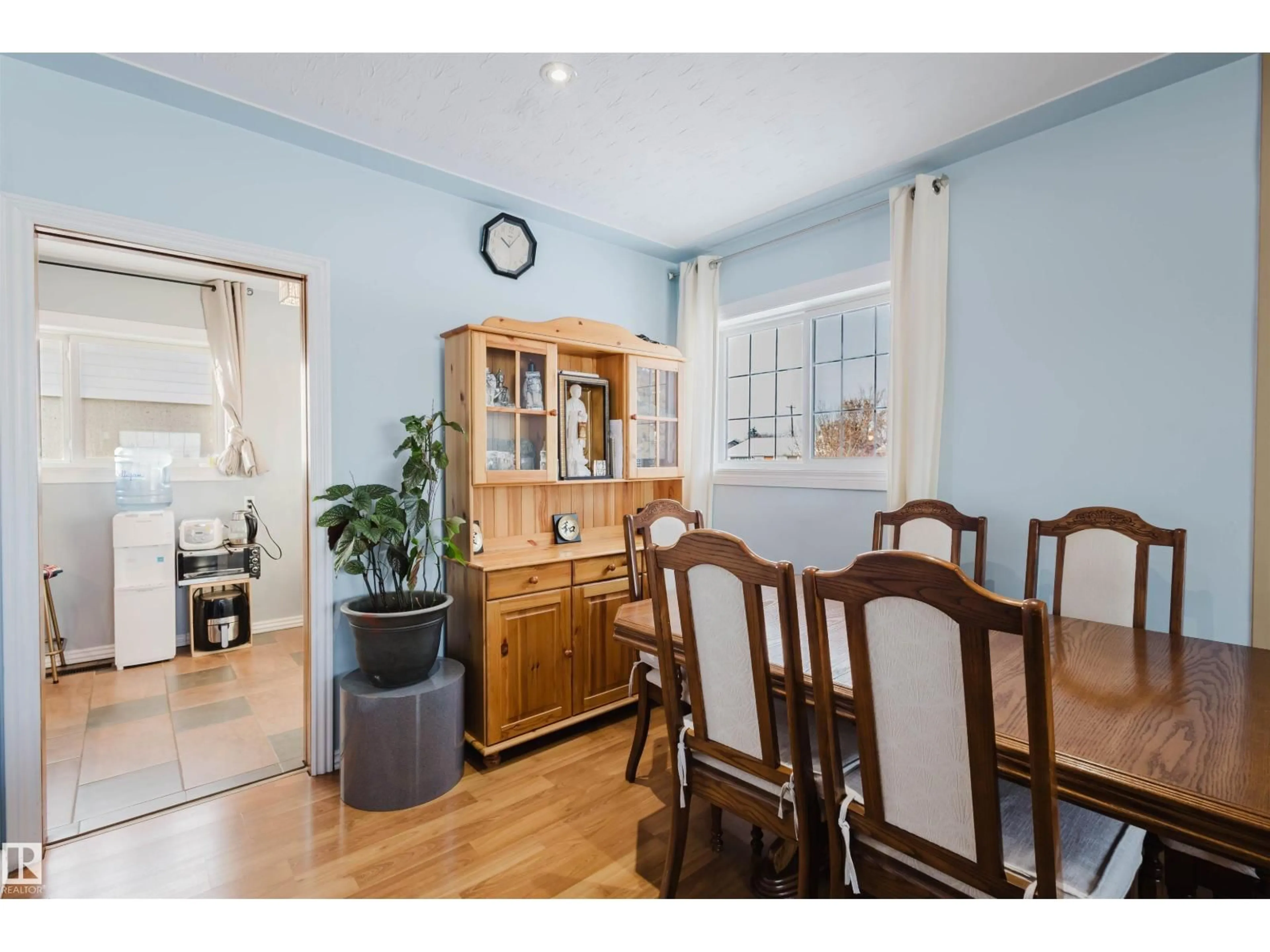 Dining room, wood/laminate floor for 13315 134 AV NW, Edmonton Alberta T5L3V7
