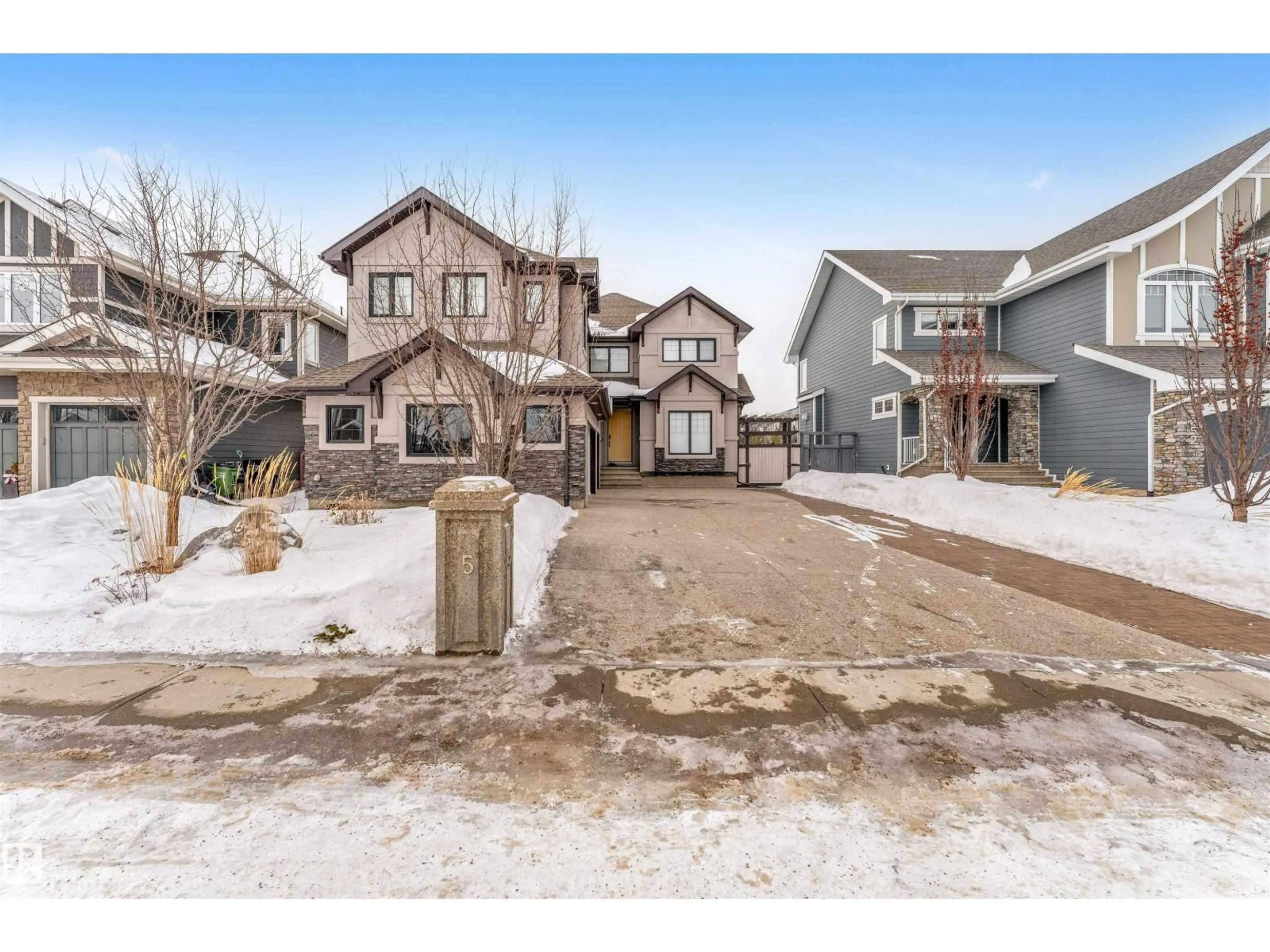 A pic from outside/outdoor area/front of a property/back of a property/a pic from drone, street for 656 180 ST, Edmonton Alberta T6W2T1