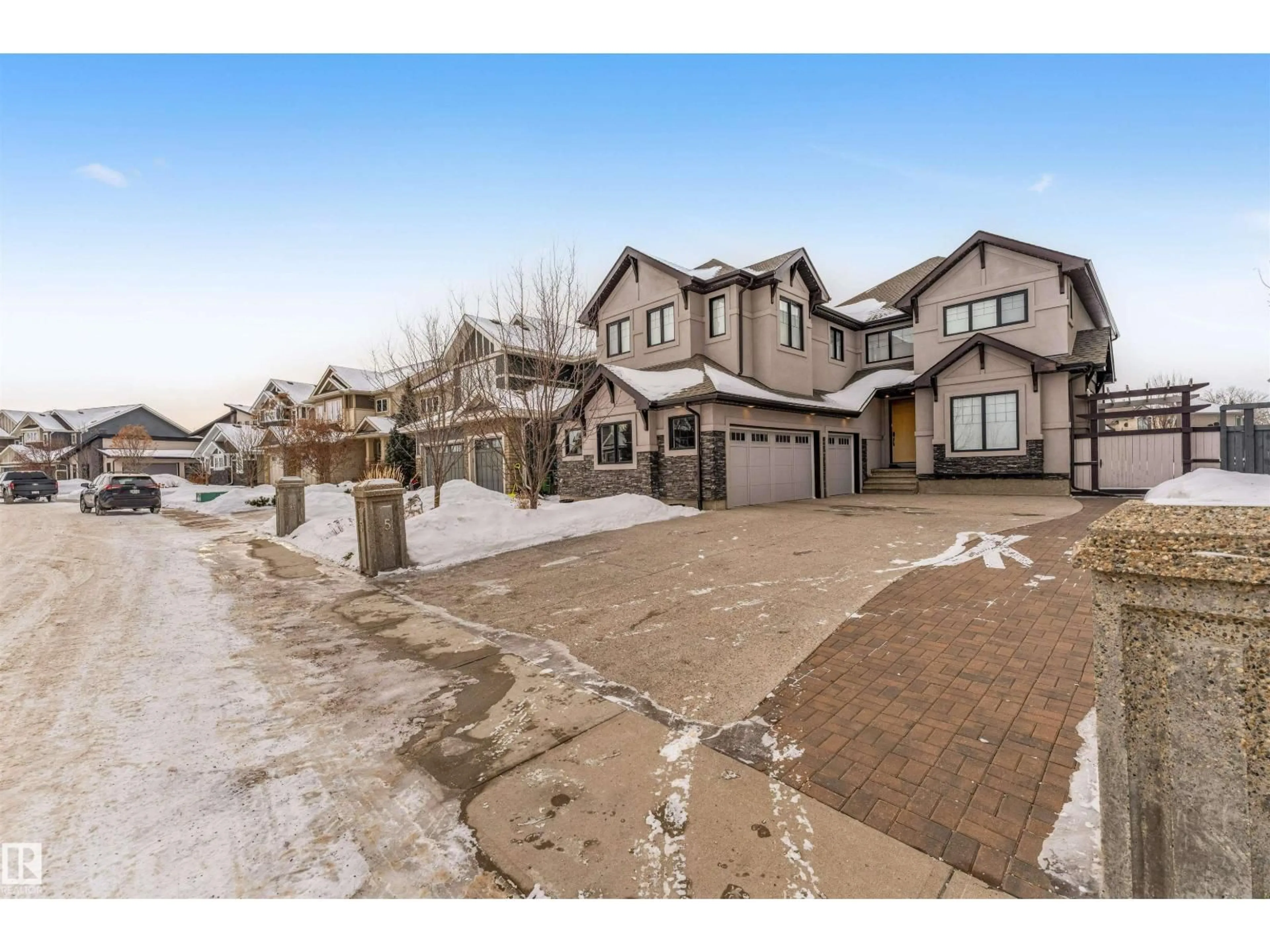 A pic from outside/outdoor area/front of a property/back of a property/a pic from drone, street for 656 180 ST, Edmonton Alberta T6W2T1