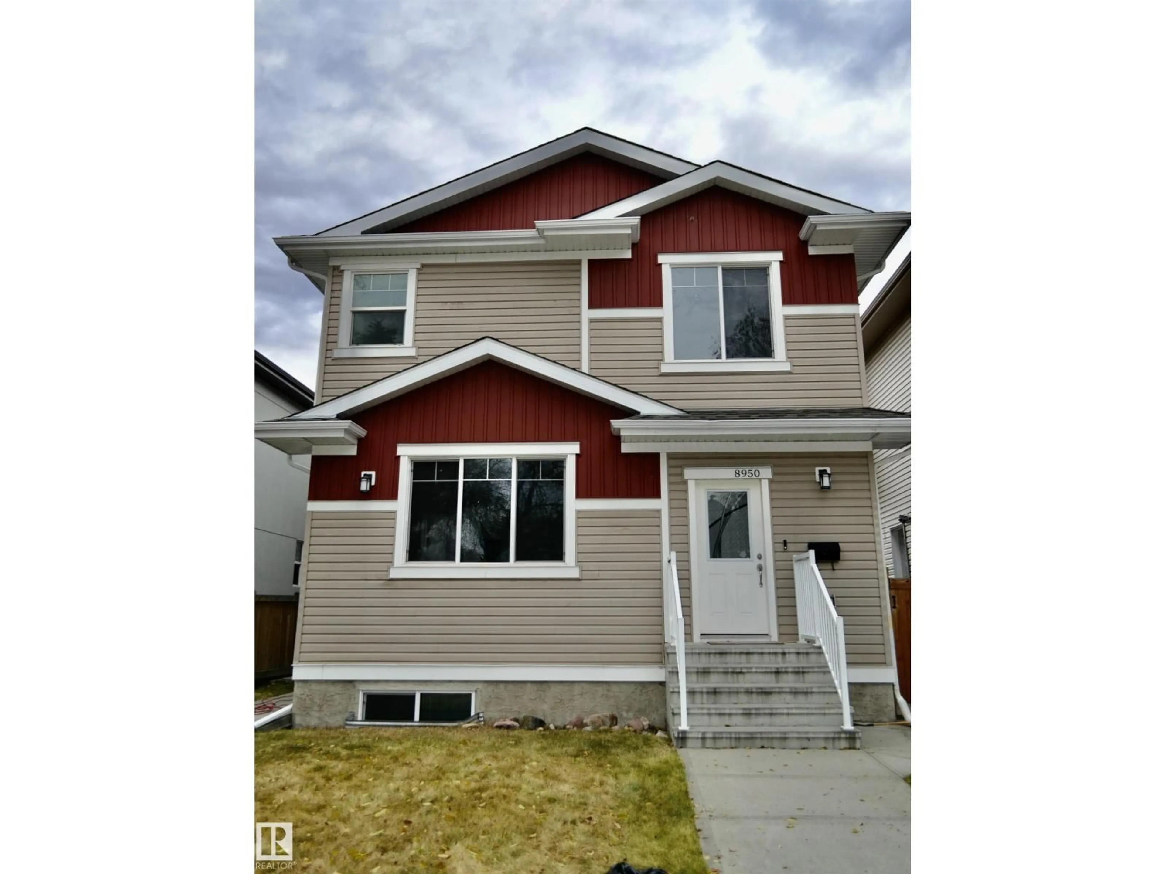 Home with vinyl exterior material, street for 8950 81 AV, Edmonton Alberta T6C0W8