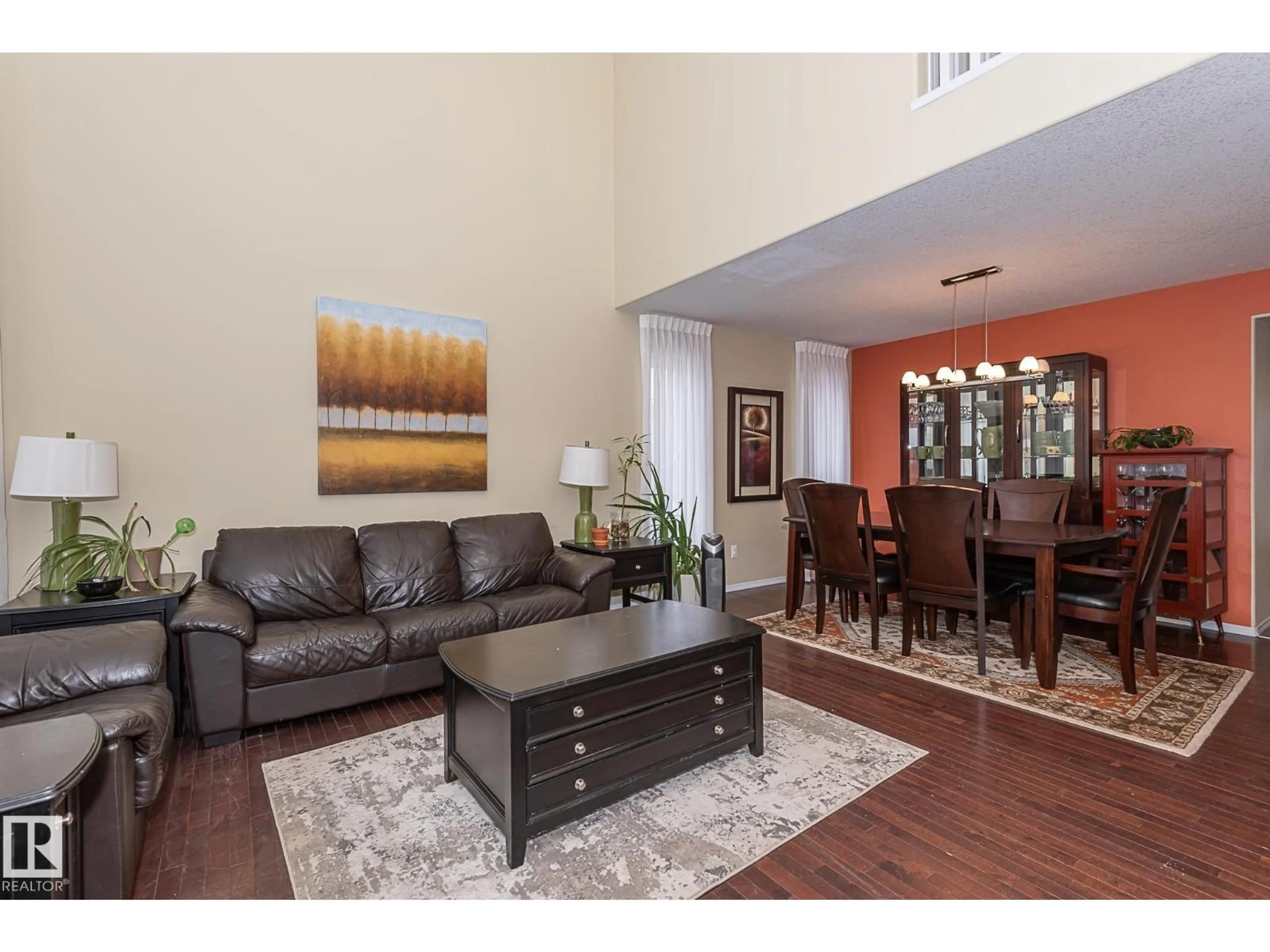 Living room with furniture, wood/laminate floor for 20628 49 AV, Edmonton Alberta T6M0C4