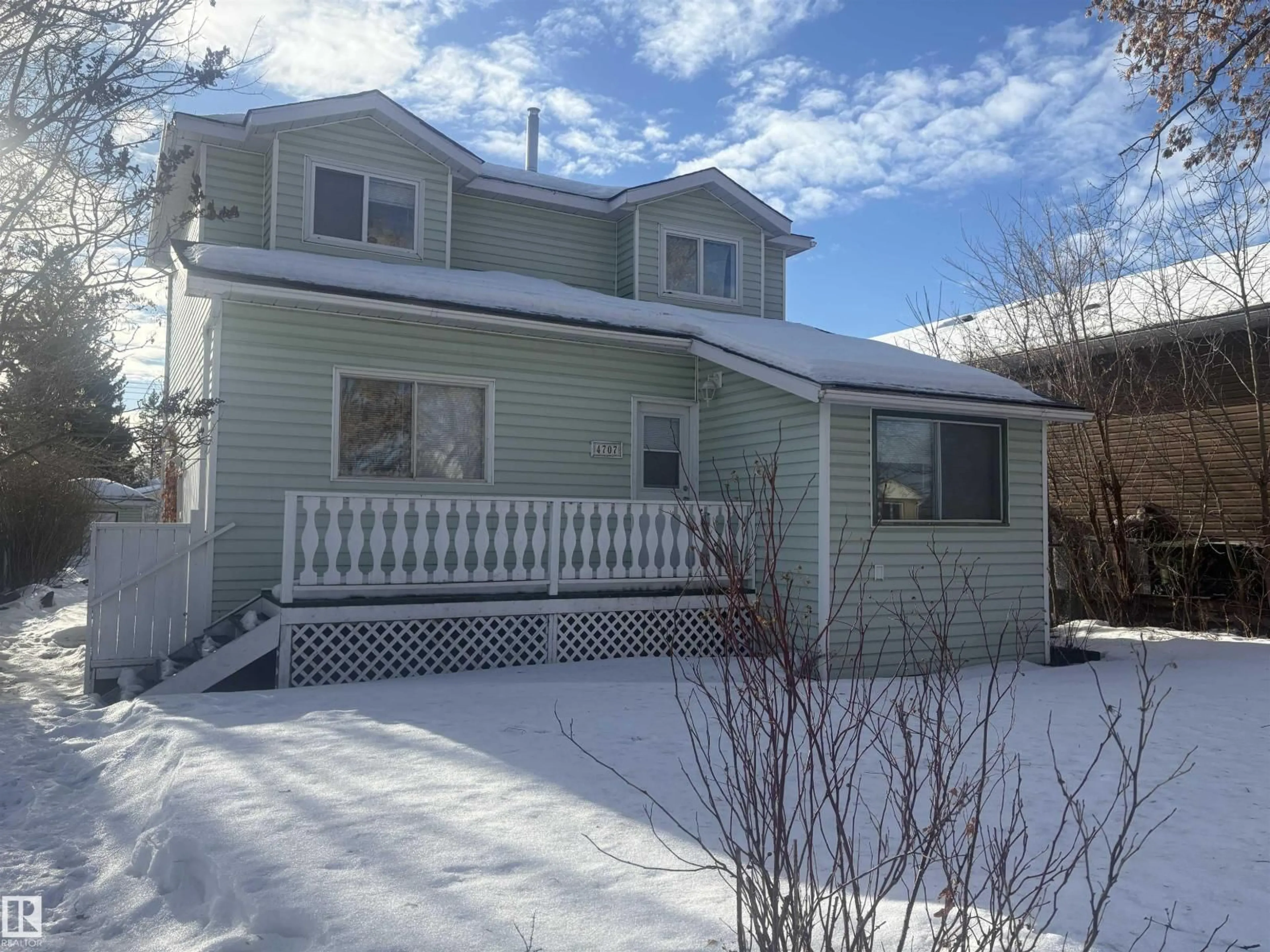 Home with vinyl exterior material, street for 4707 47 AV, Redwater Alberta T0A2W0