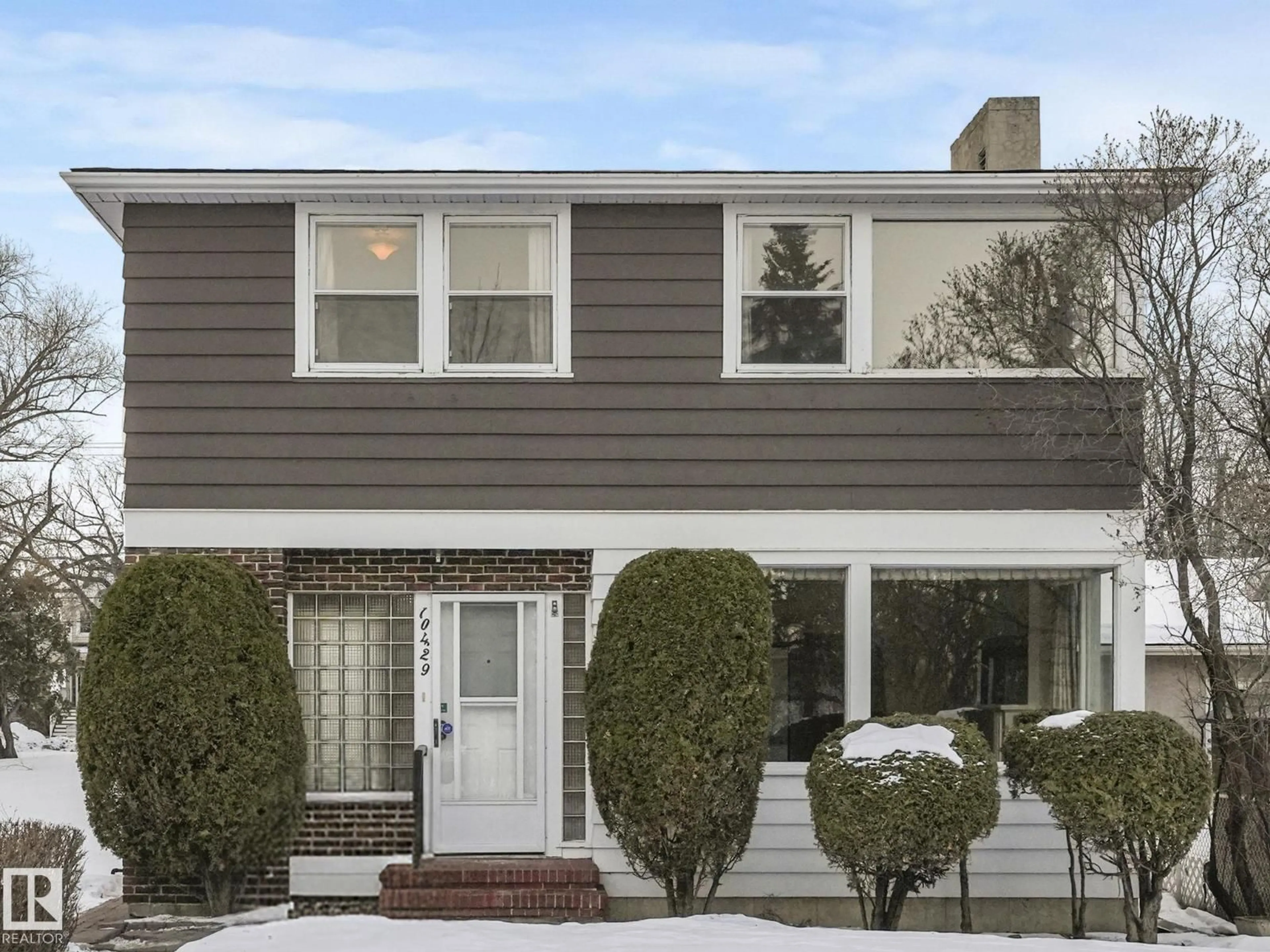 Home with vinyl exterior material, street for 10429 SASKATCHEWAN DR, Edmonton Alberta T6E4R8
