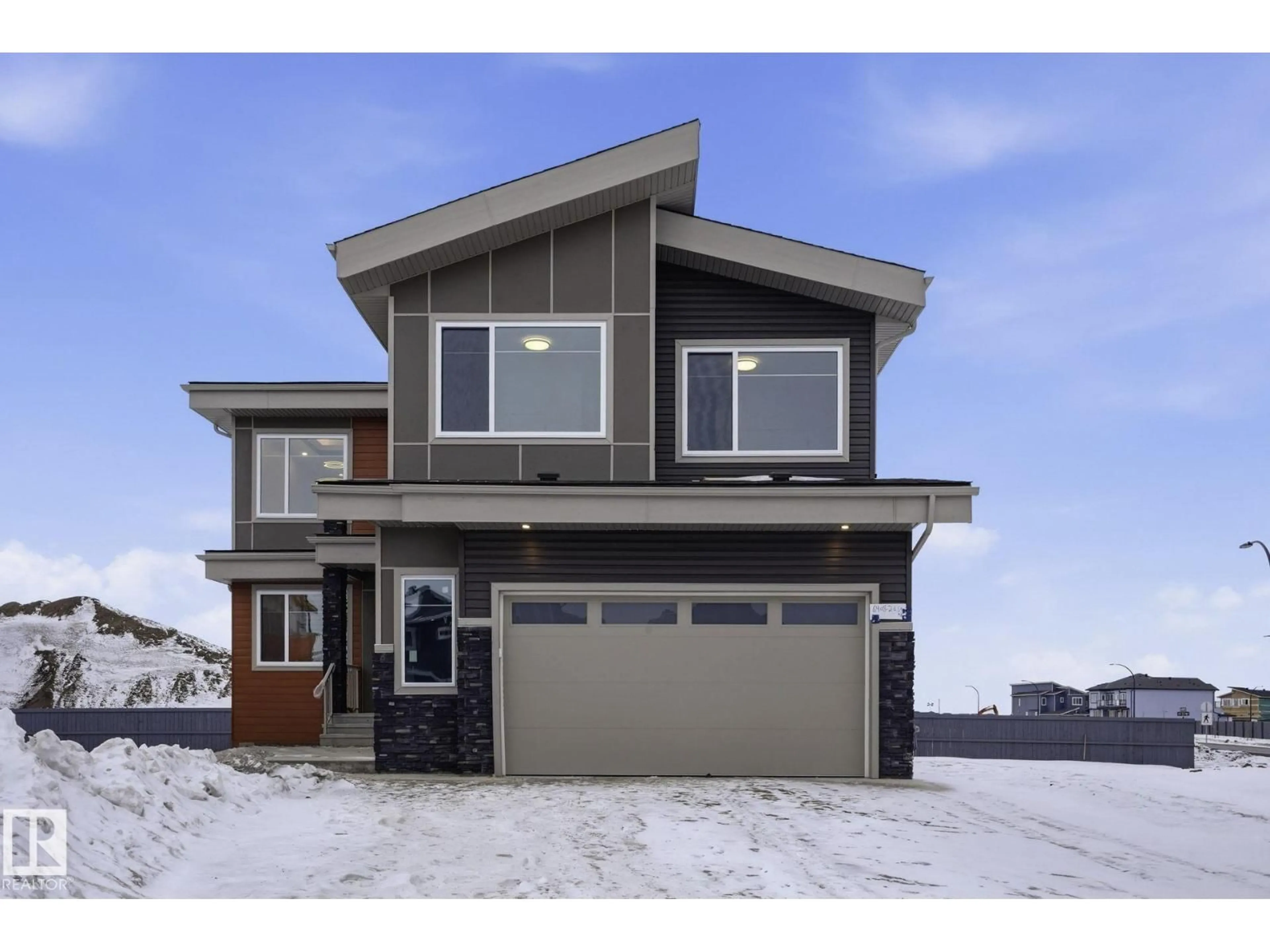 Home with vinyl exterior material, street for NE - 6408 26 ST, Rural Leduc County Alberta T4X2C1