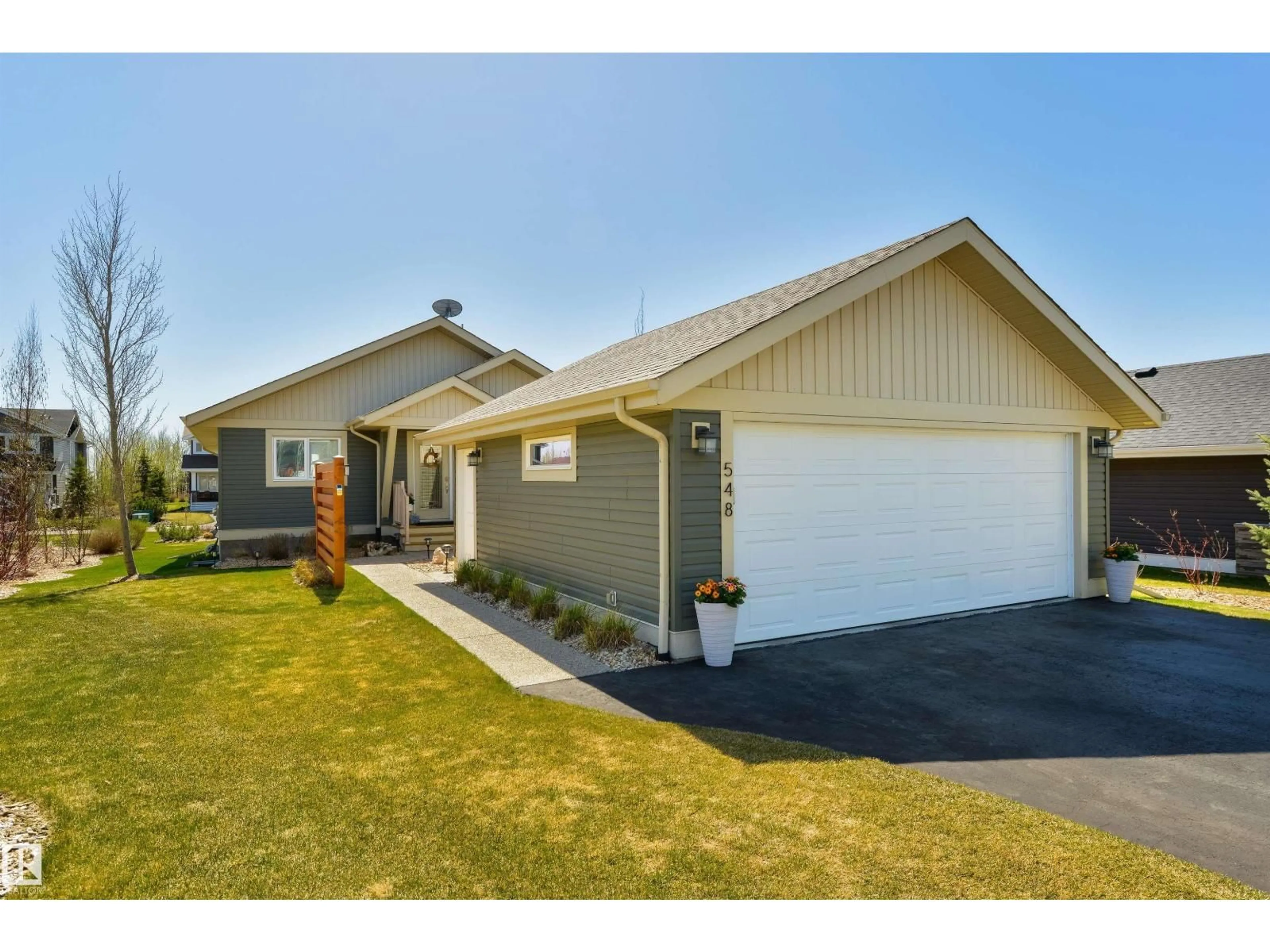 Home with vinyl exterior material, street for STE. 55101 - 548 ANNE TR, Rural Lac Ste. Anne County Alberta T0E1A1