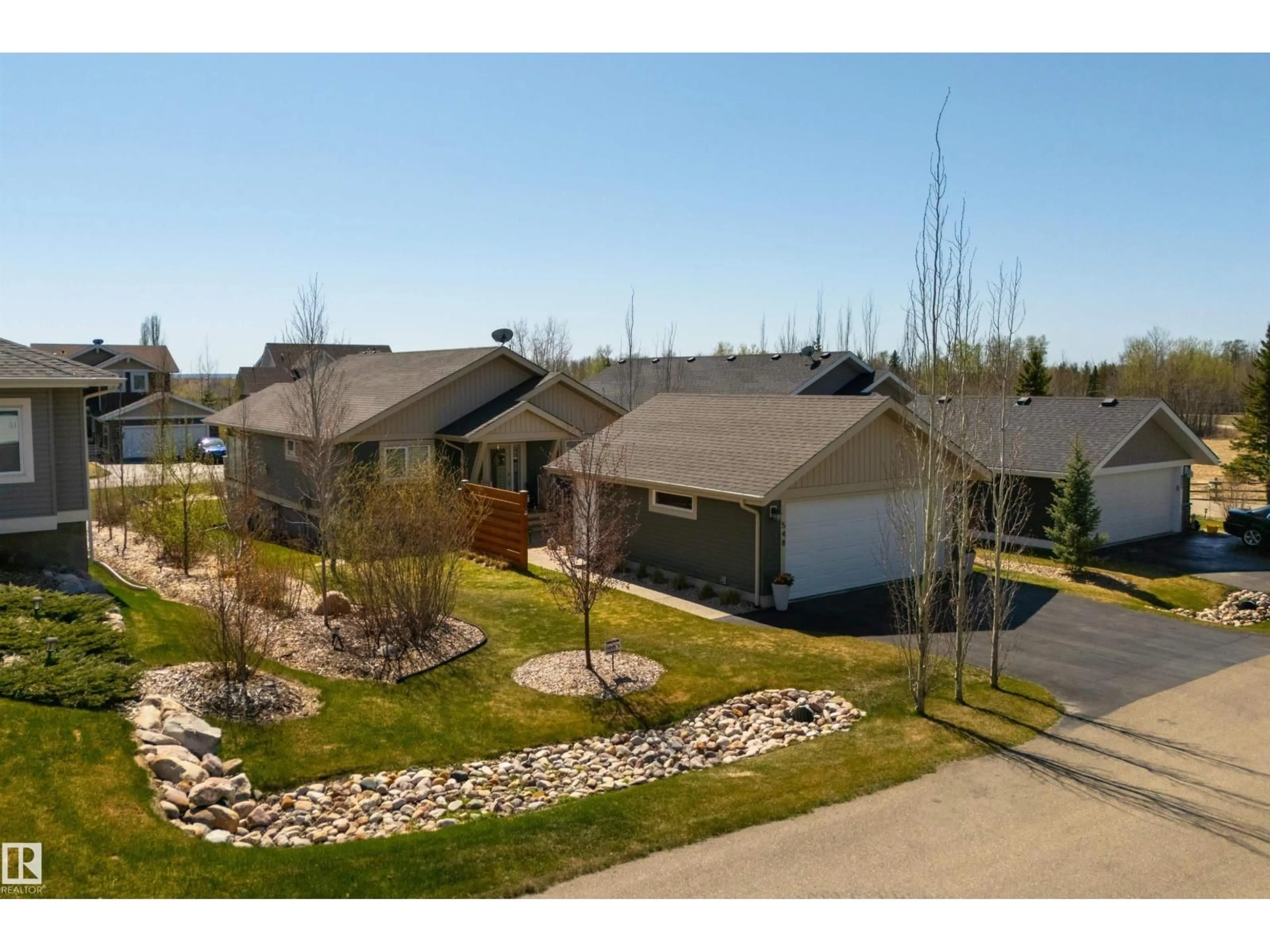 A pic from outside/outdoor area/front of a property/back of a property/a pic from drone, street for STE. 55101 - 548 ANNE TR, Rural Lac Ste. Anne County Alberta T0E1A1