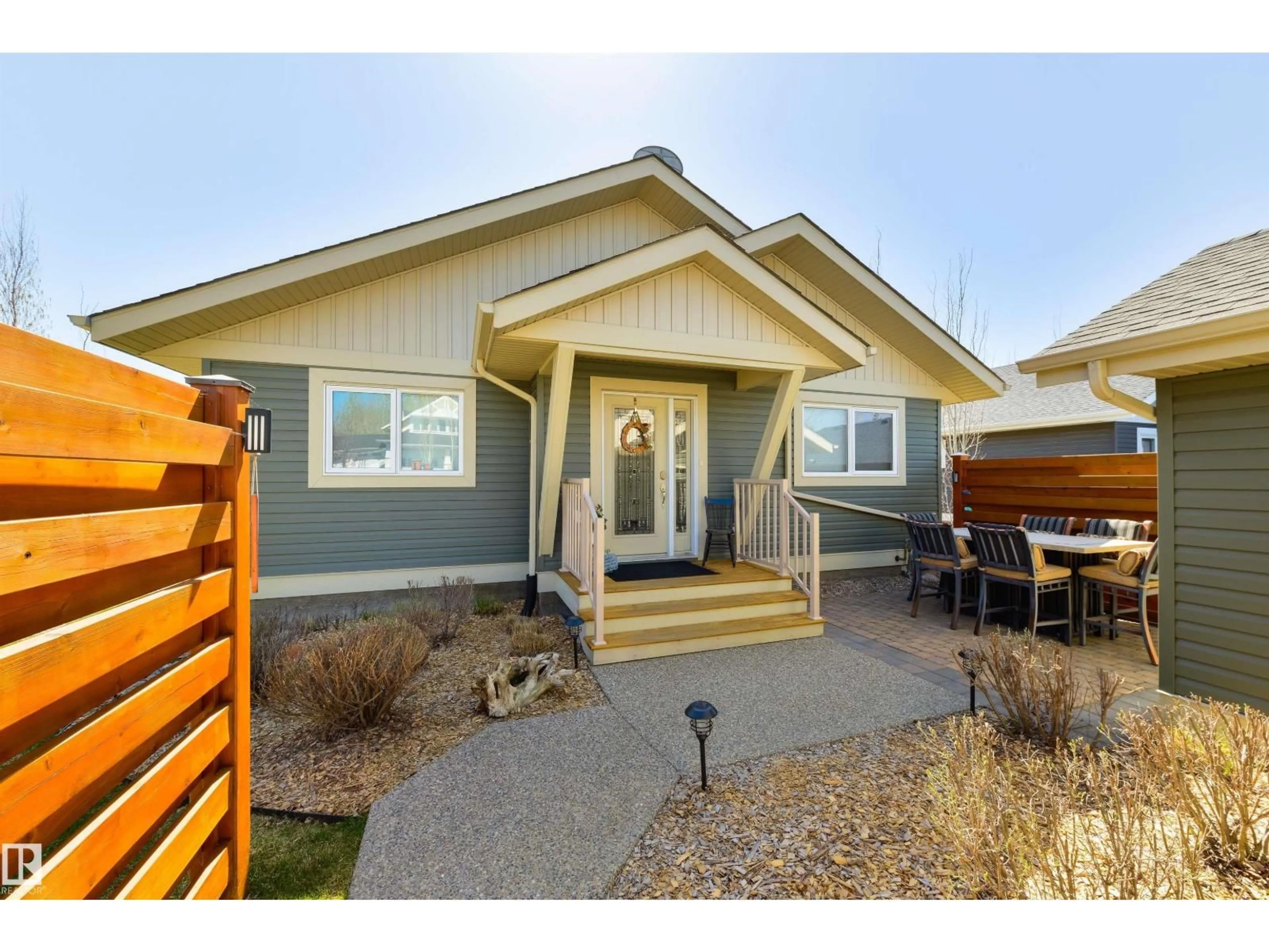 Home with vinyl exterior material, street for STE. 55101 - 548 ANNE TR, Rural Lac Ste. Anne County Alberta T0E1A1