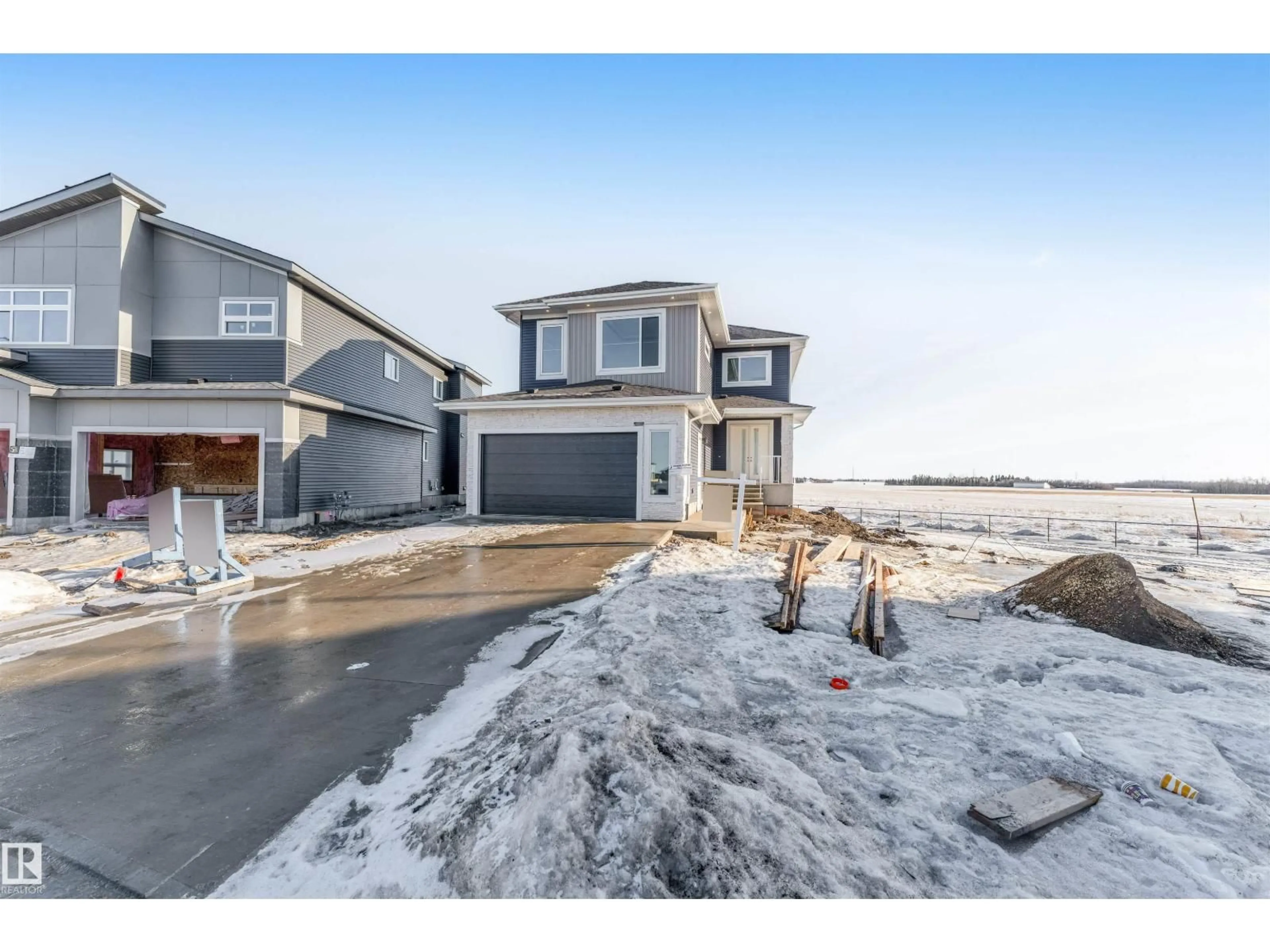 A pic from outside/outdoor area/front of a property/back of a property/a pic from drone, street for 6409 26 ST, Rural Leduc County Alberta T4X0H6
