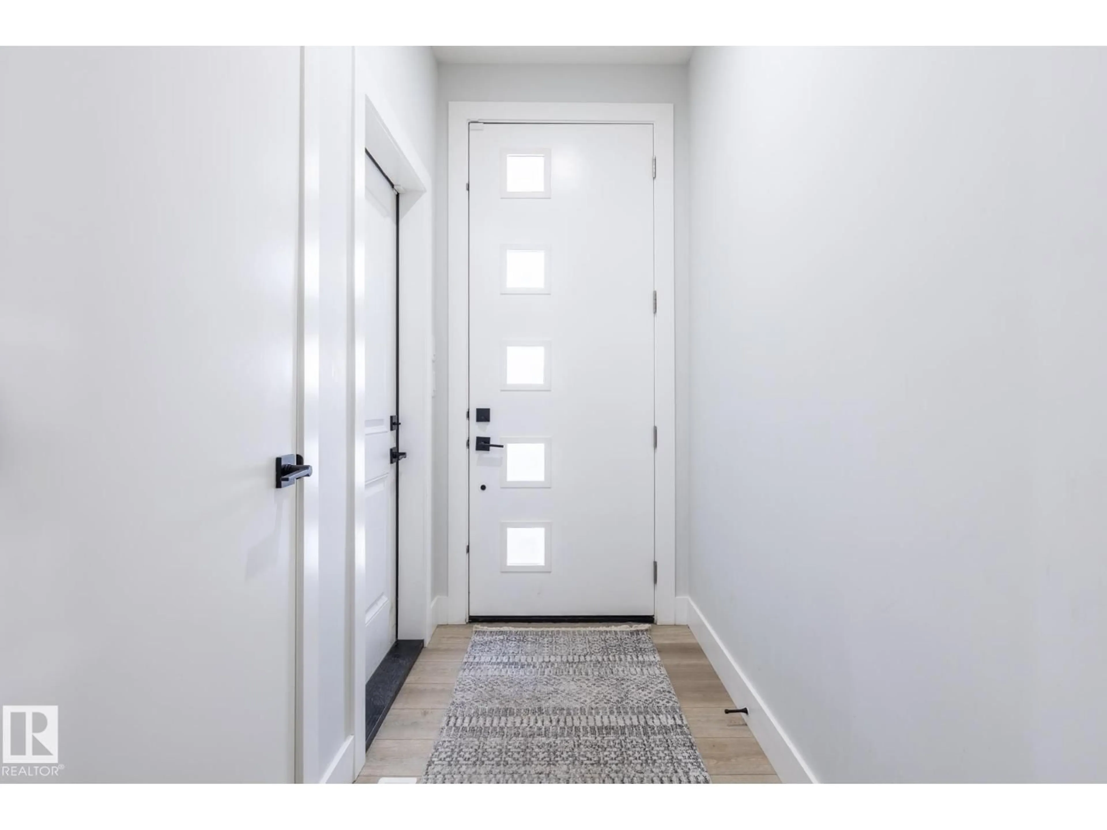 Indoor entryway for 19708 28 AV, Edmonton Alberta T6M1M1