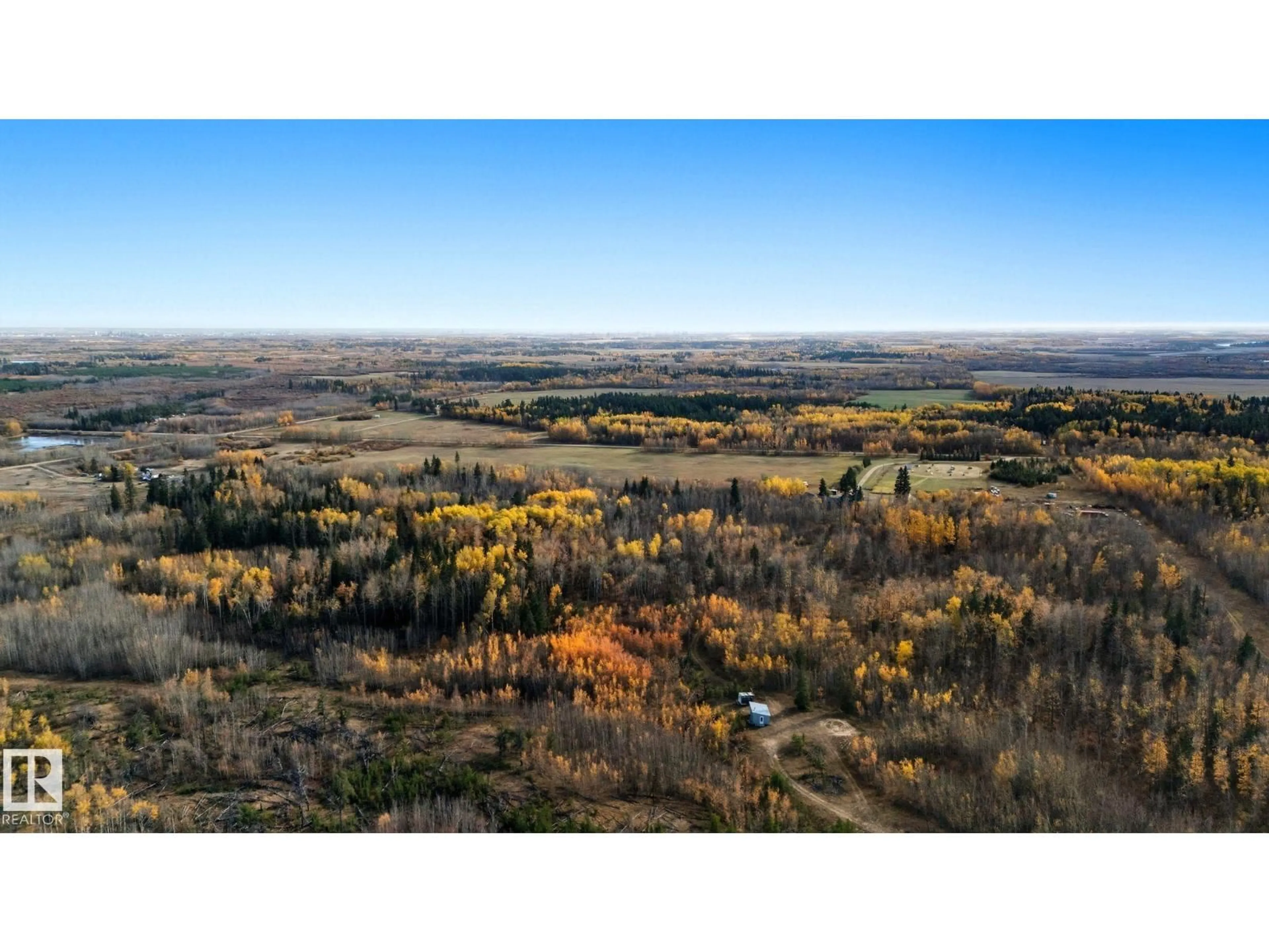 A pic from outside/outdoor area/front of a property/back of a property/a pic from drone, forest/trees view for 22516 TWP ROAD 572, Rural Sturgeon County Alberta T0A1N5
