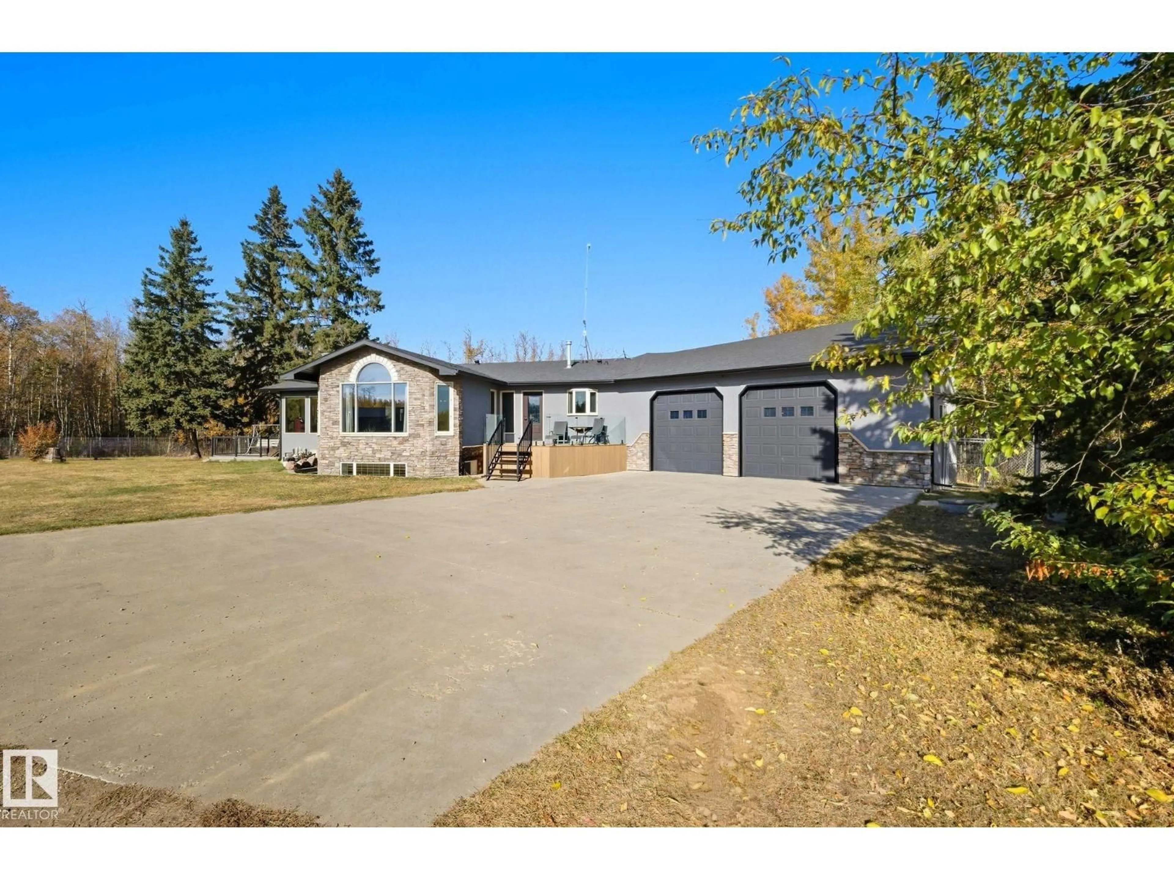 A pic from outside/outdoor area/front of a property/back of a property/a pic from drone, street for 22516 TWP ROAD 572, Rural Sturgeon County Alberta T0A1N5