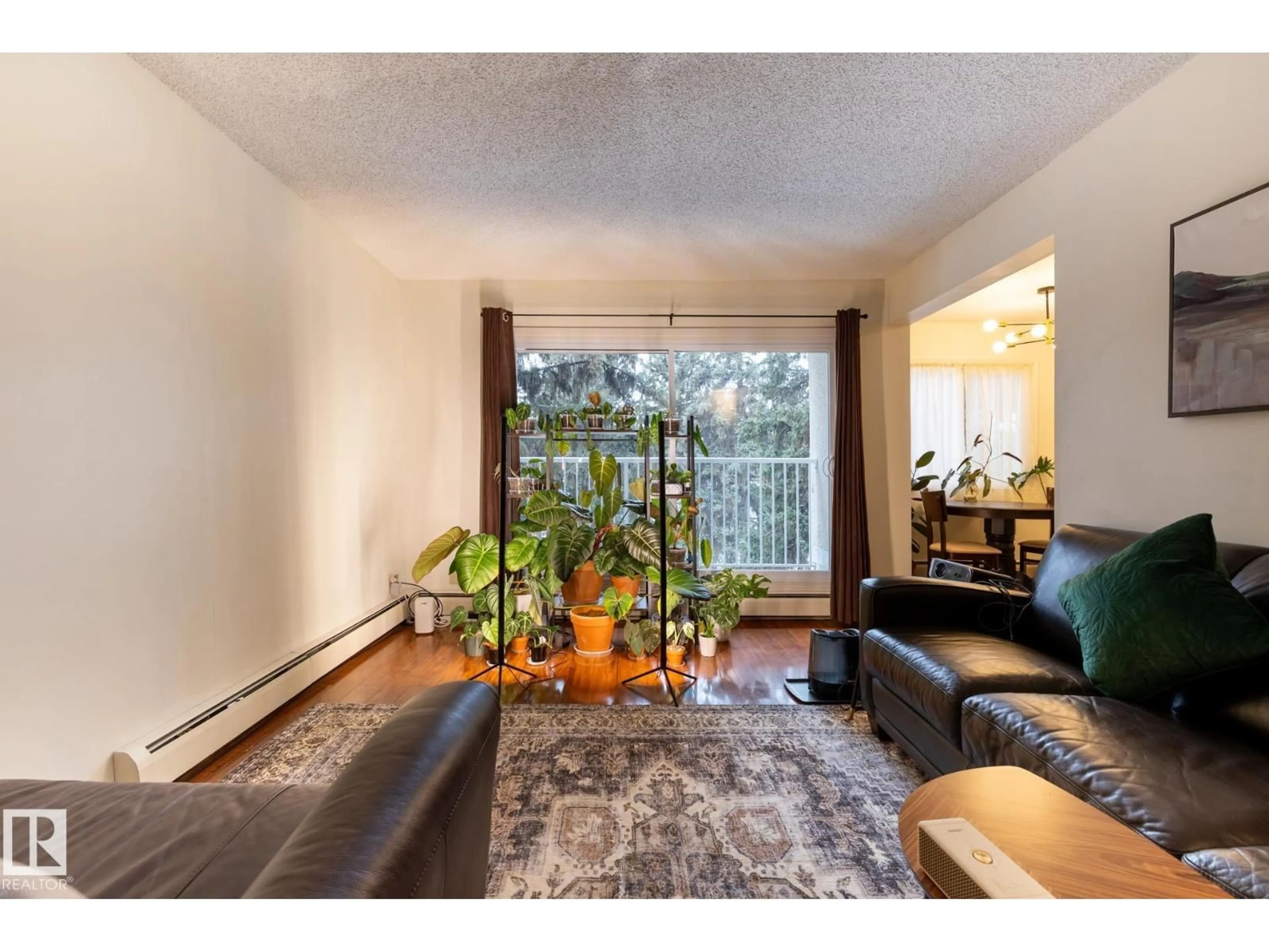 Living room with furniture, unknown for #307 - 5730 RIVERBEND RD, Edmonton Alberta T6H4H4