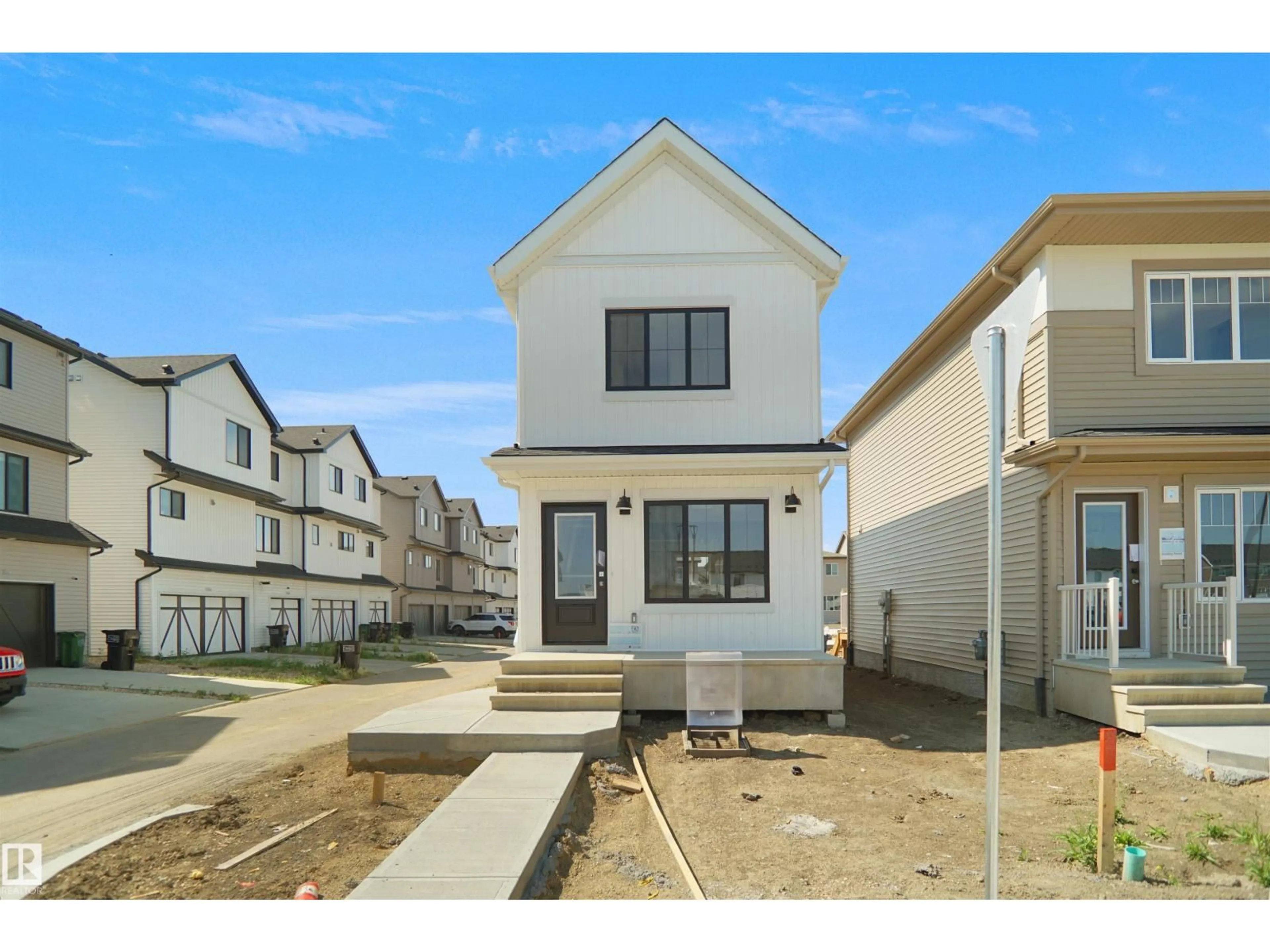 Home with vinyl exterior material, street for 4362 KINGLET DR, Edmonton Alberta T5S0T1