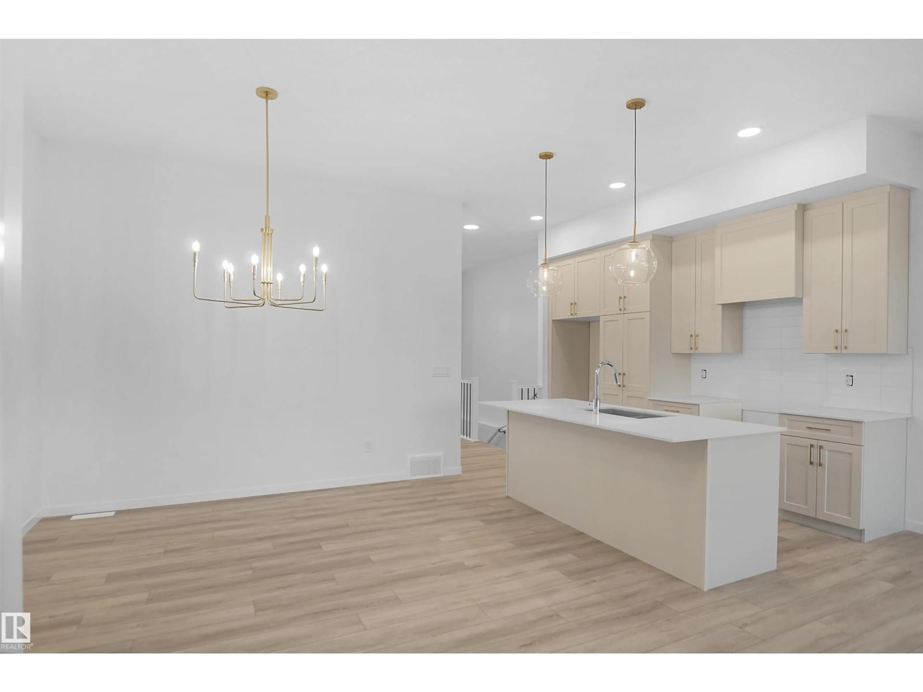 Open concept kitchen, wood/laminate floor for 7505 OBSERVER LN, Edmonton Alberta T5G2S5