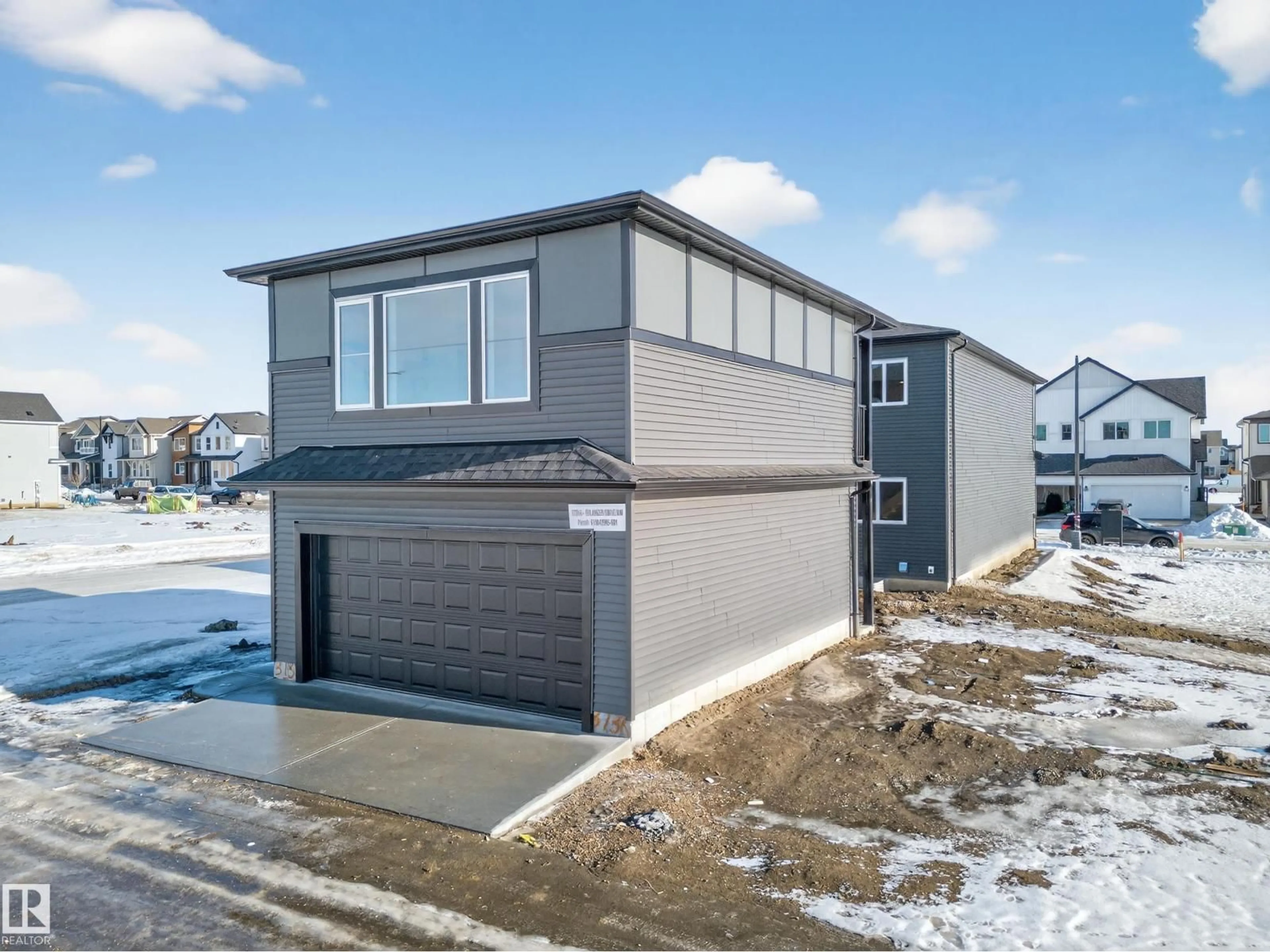 Home with vinyl exterior material, street for 3736 ERLANGER DR, Edmonton Alberta T6M3G5