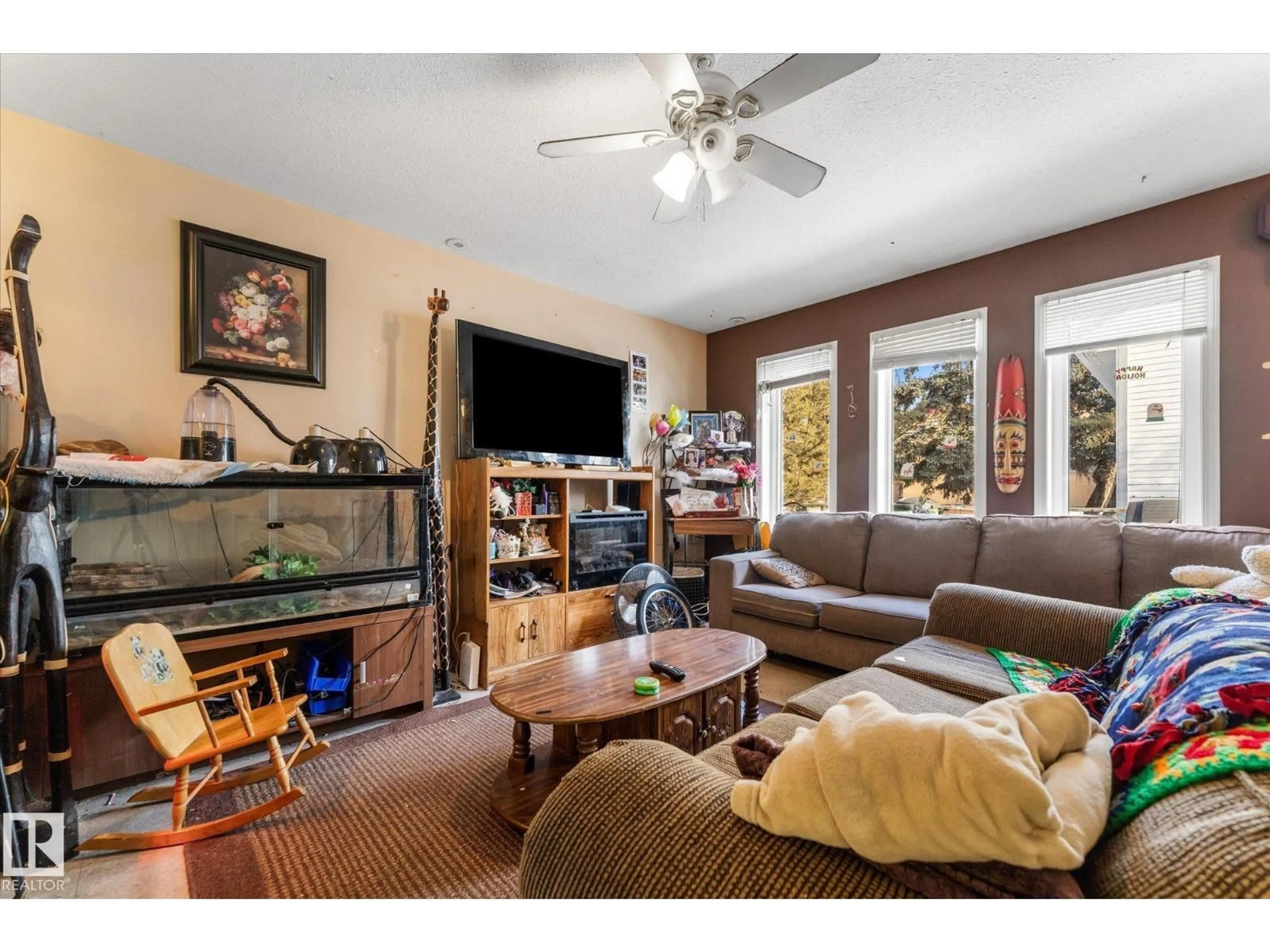 Living room with furniture, unknown for (A,B,C,D) - 4804 51 AV, Wetaskiwin Alberta T9A0T7