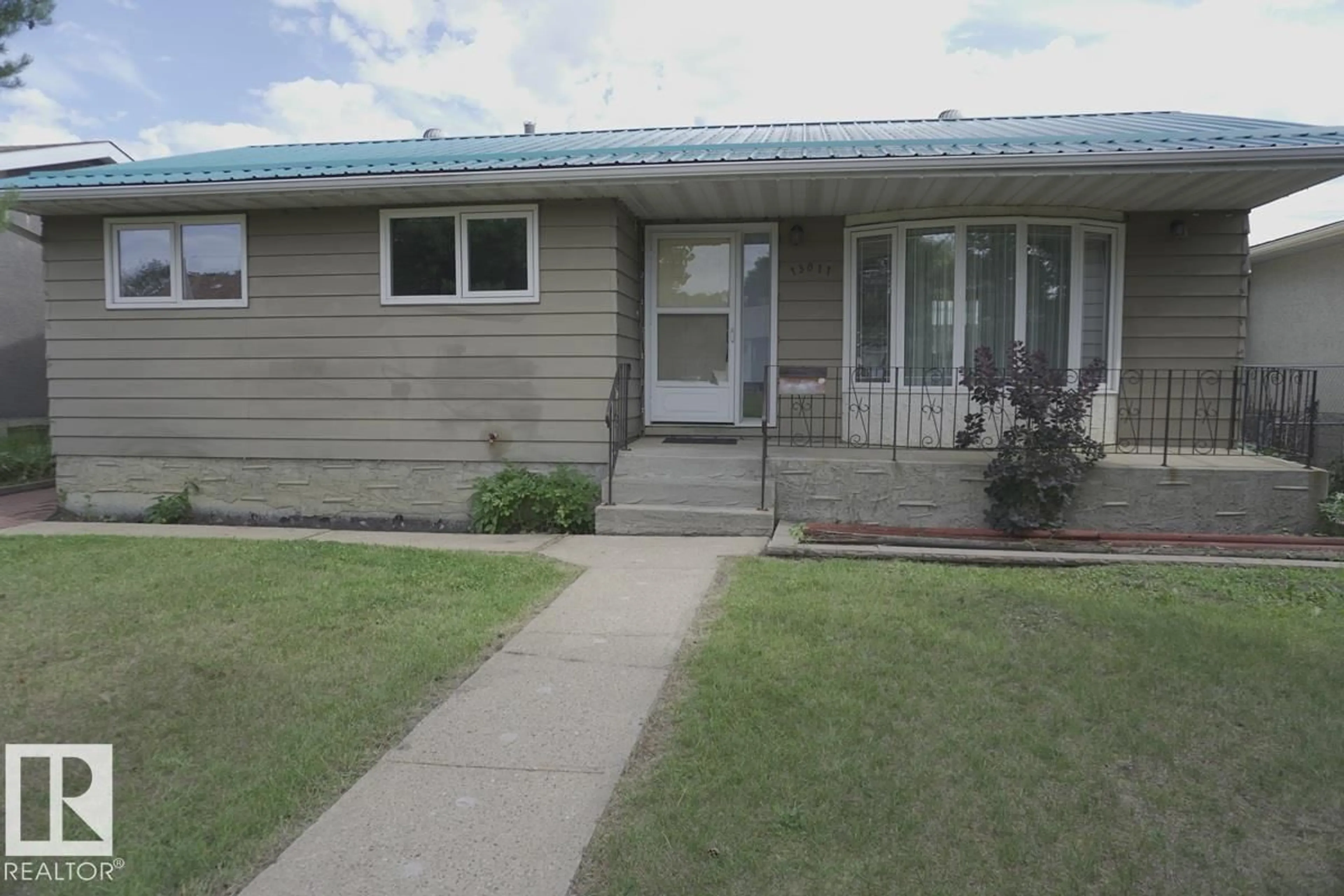 Home with vinyl exterior material, street for 13011 123 ST, Edmonton Alberta T5J0J8