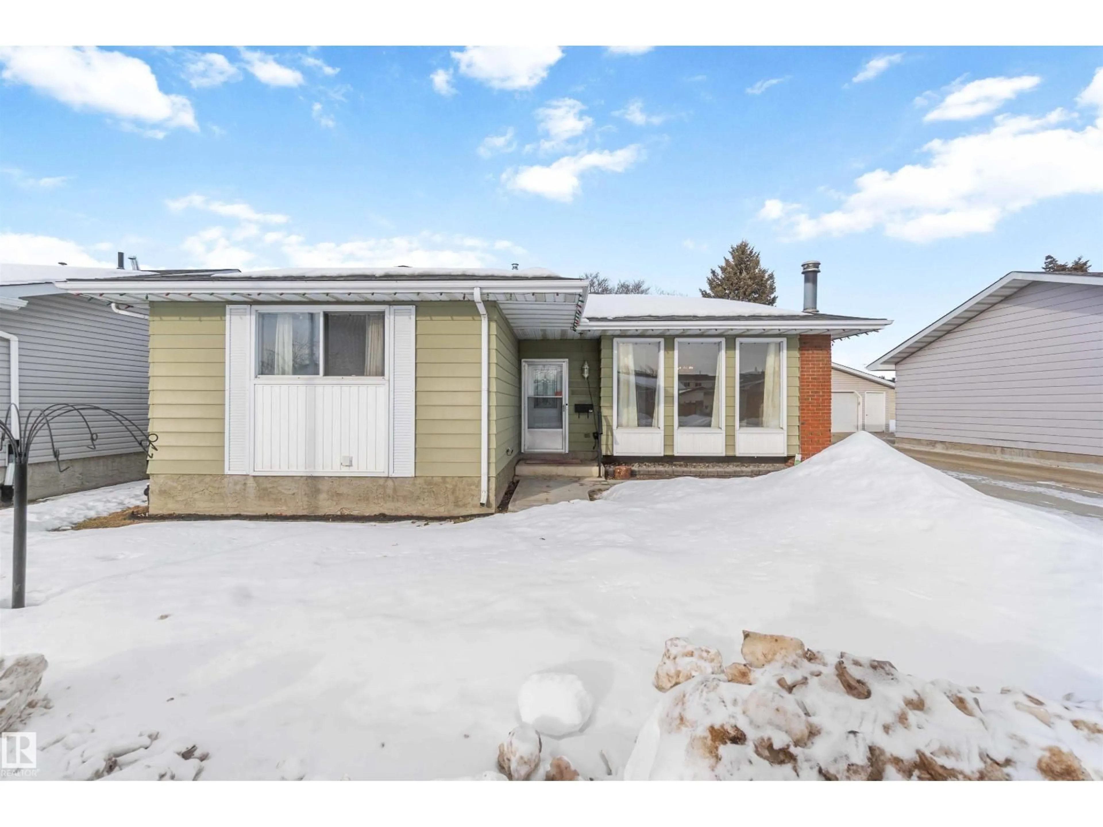 Home with vinyl exterior material, street for 4130 134A AV, Edmonton Alberta T5A2N5