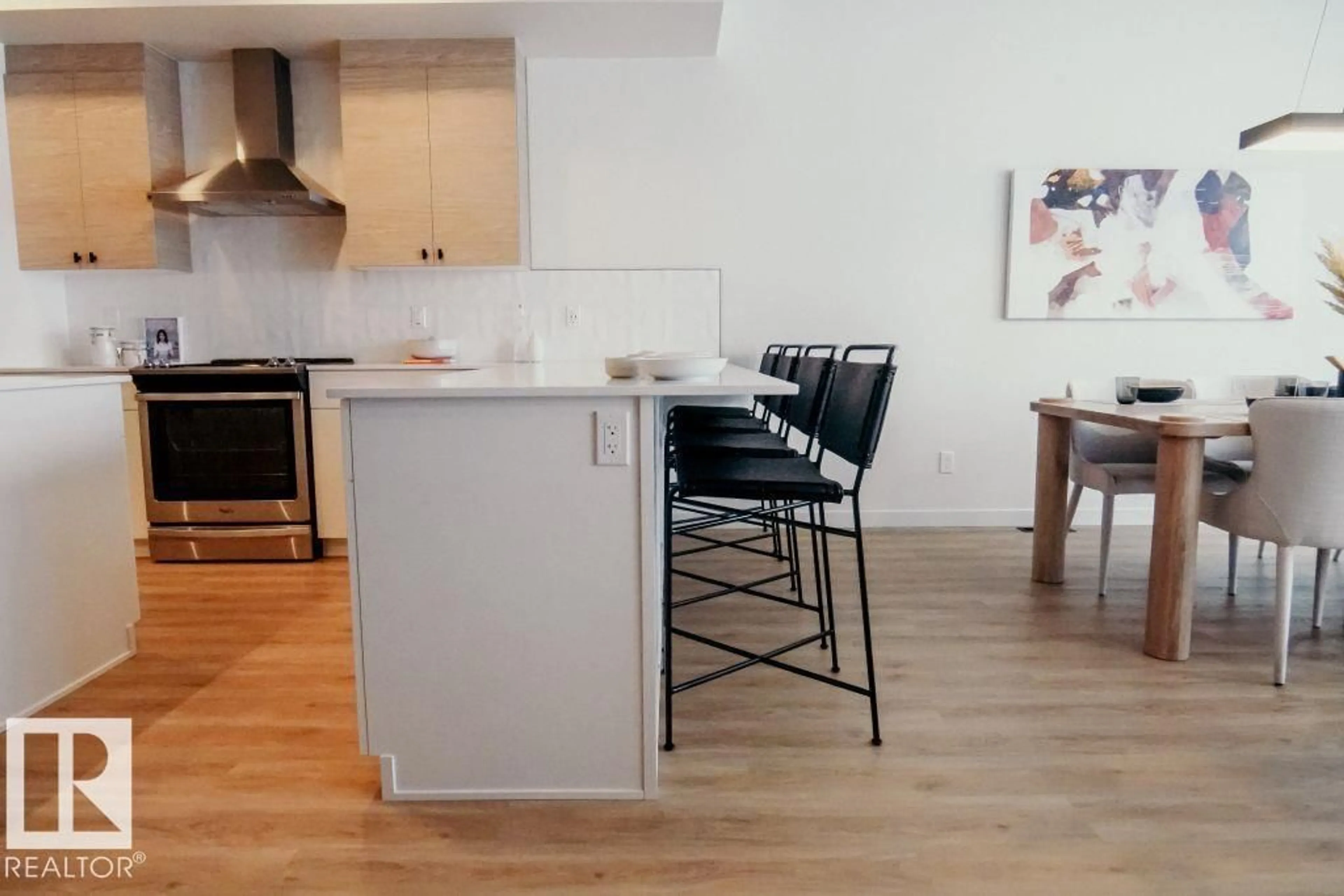 Open concept kitchen, wood/laminate floor for 7365 KLAPSTEIN CR, Edmonton Alberta T6W5R8