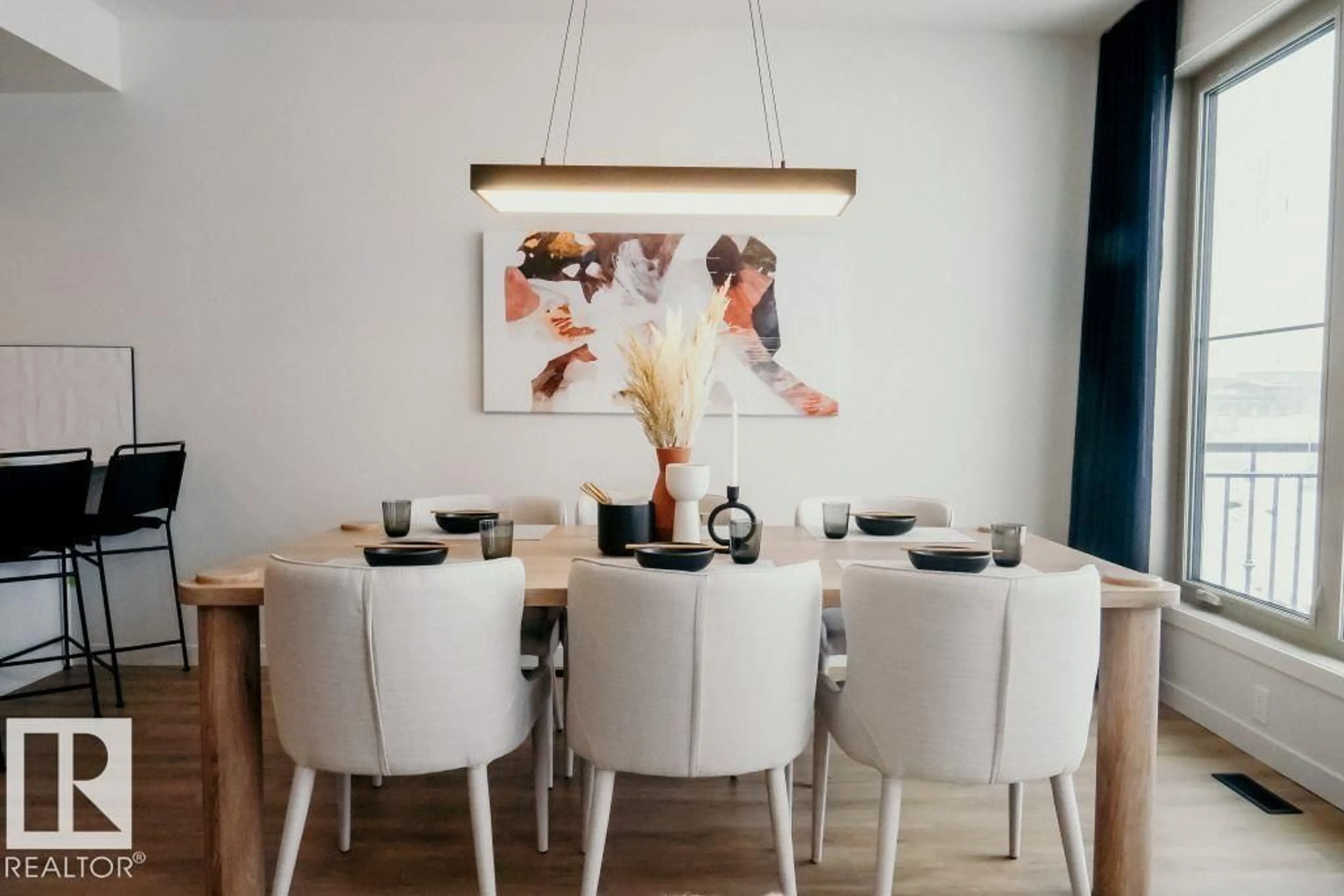 Dining room, wood/laminate floor for 7365 KLAPSTEIN CR, Edmonton Alberta T6W5R8