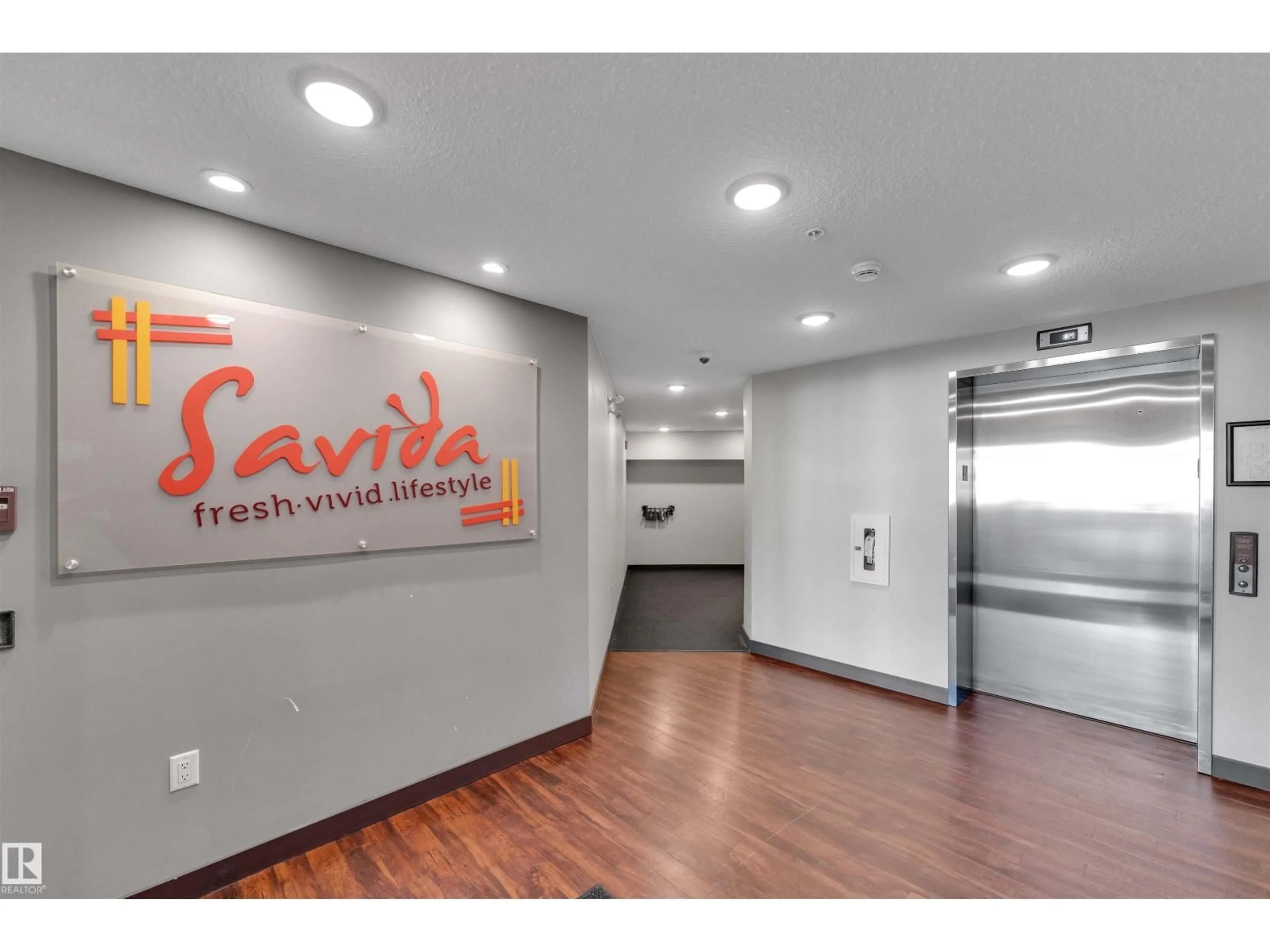 Indoor foyer for 319 - 3670 139 AV NW, Edmonton Alberta T5Y3N5