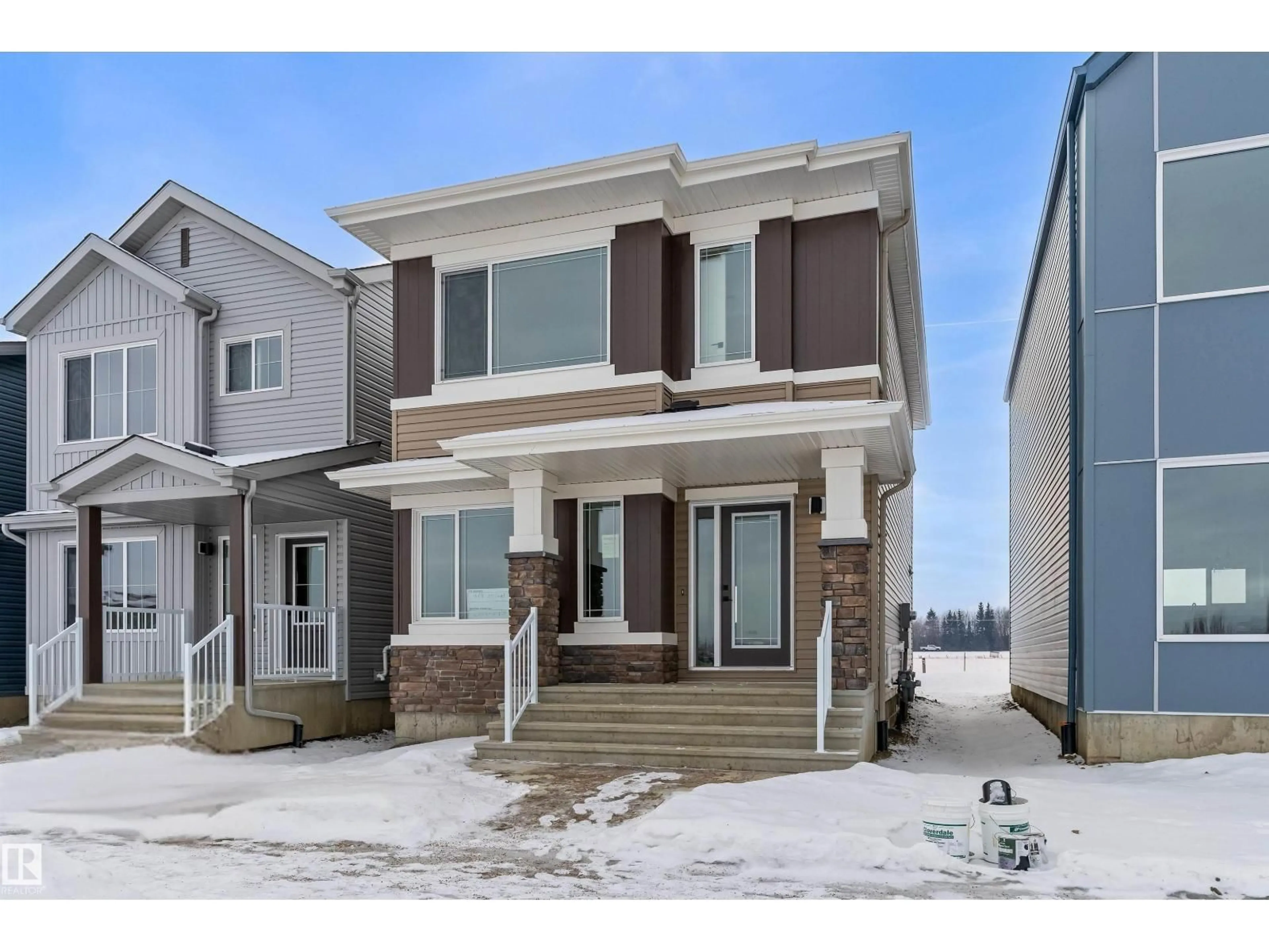 Home with vinyl exterior material, street for 1068 MCLEOD AV, Spruce Grove Alberta T7X4G9