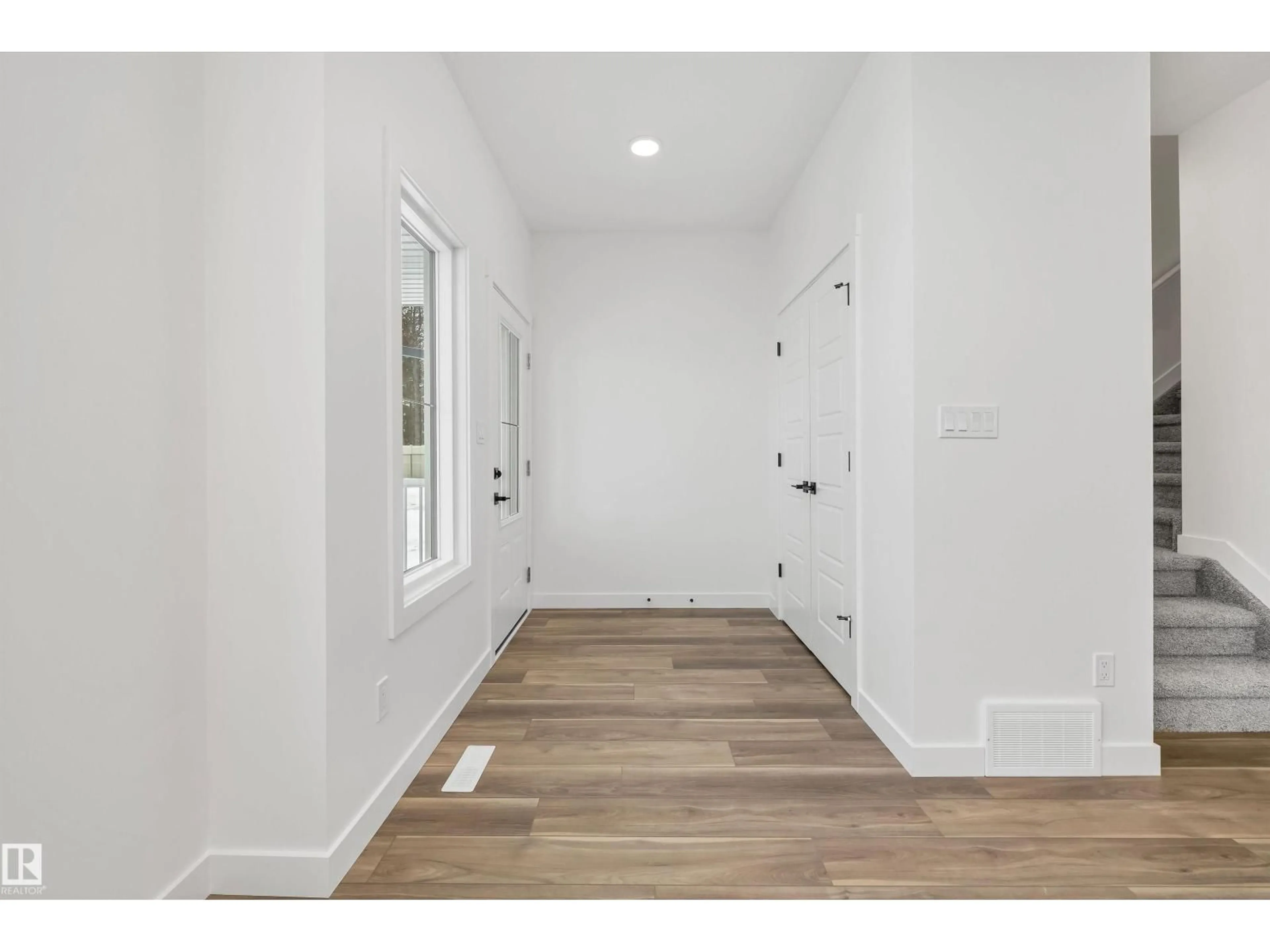 Indoor entryway for 19051 20 AV, Edmonton Alberta T6M3E8