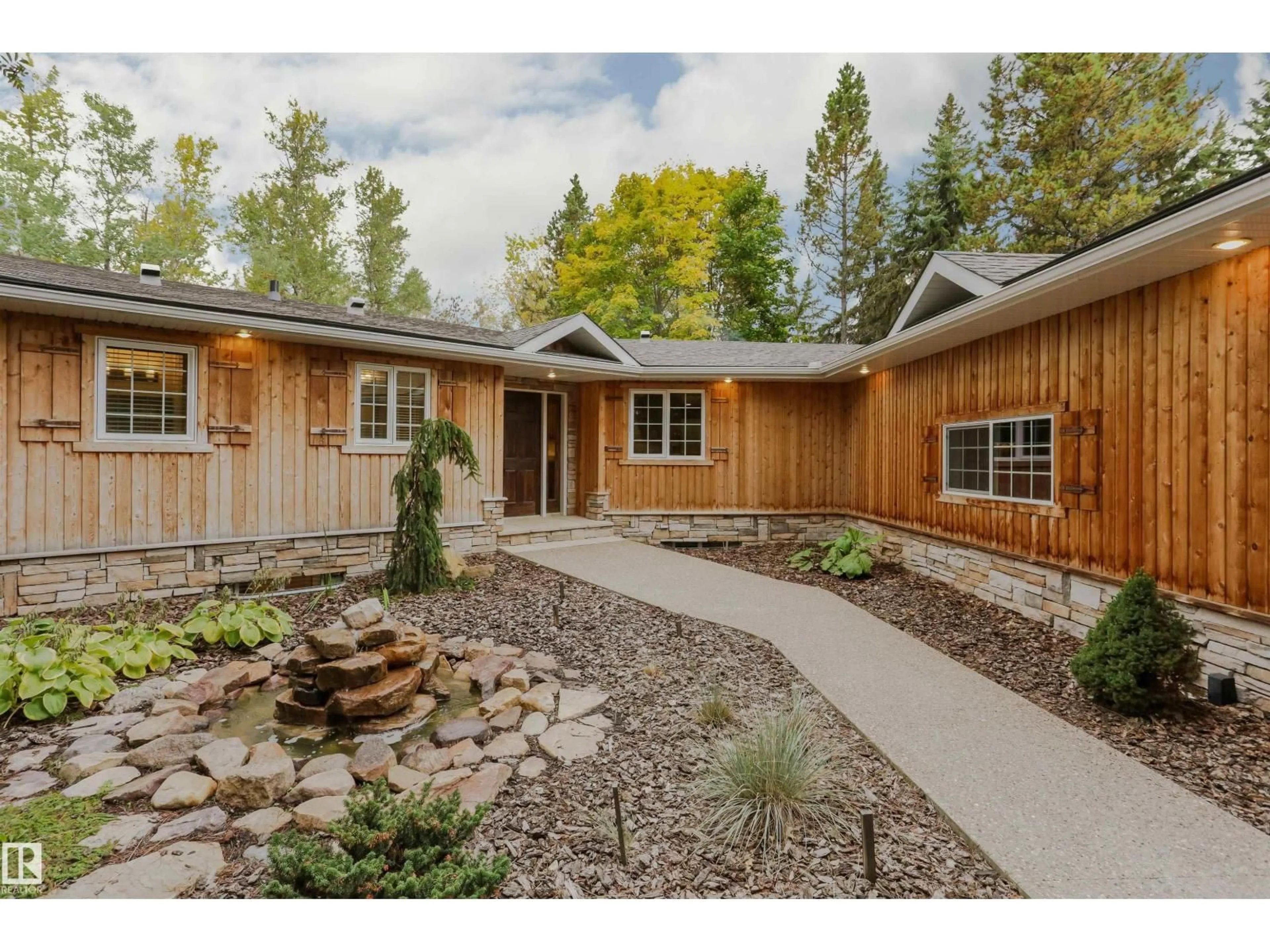 Home with vinyl exterior material, street for 70 - 50450 RGE RD, Rural Leduc County Alberta T4X0L4