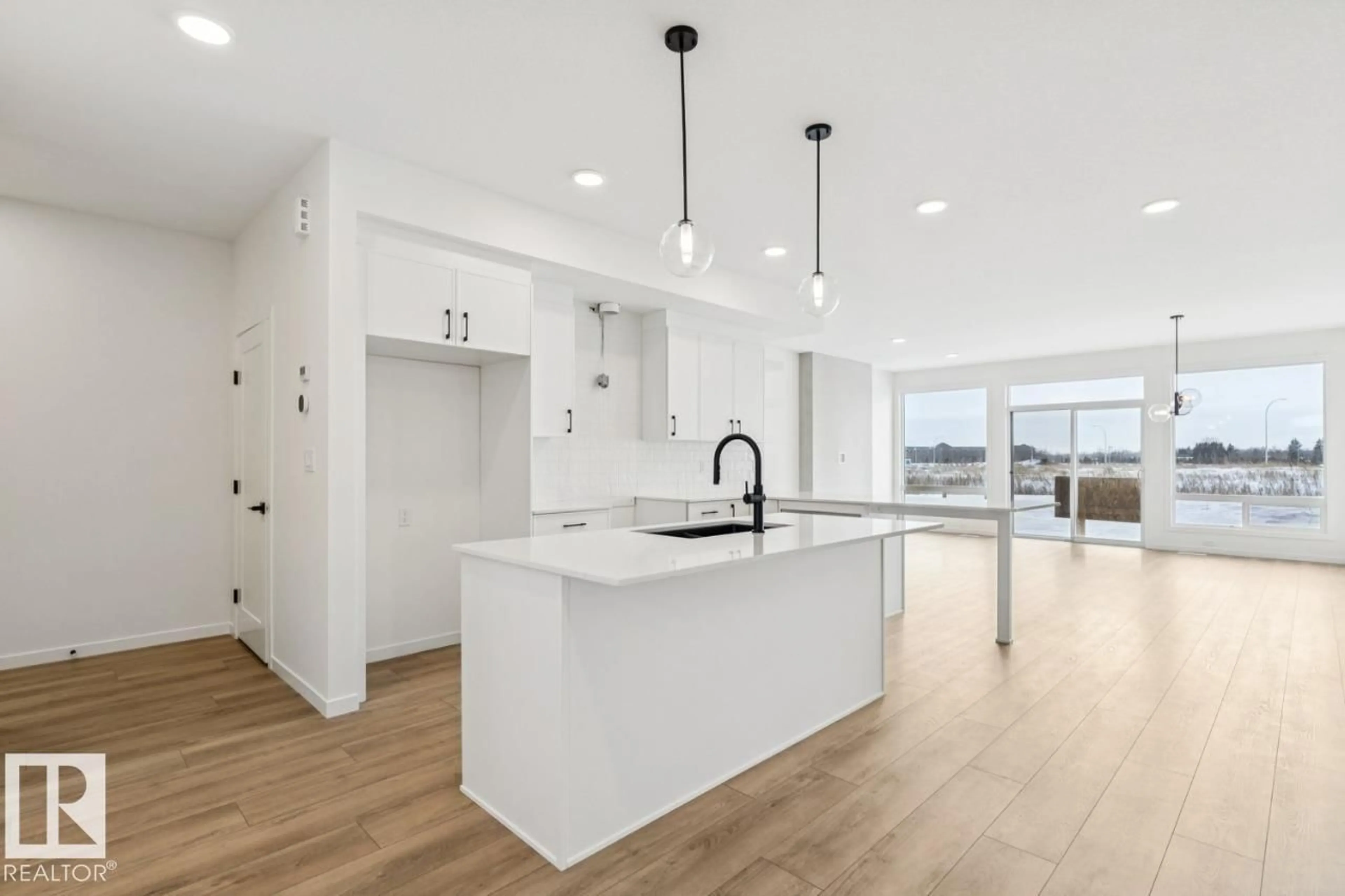 Open concept kitchen, unknown for 22927 80 AV, Edmonton Alberta T5T5X7
