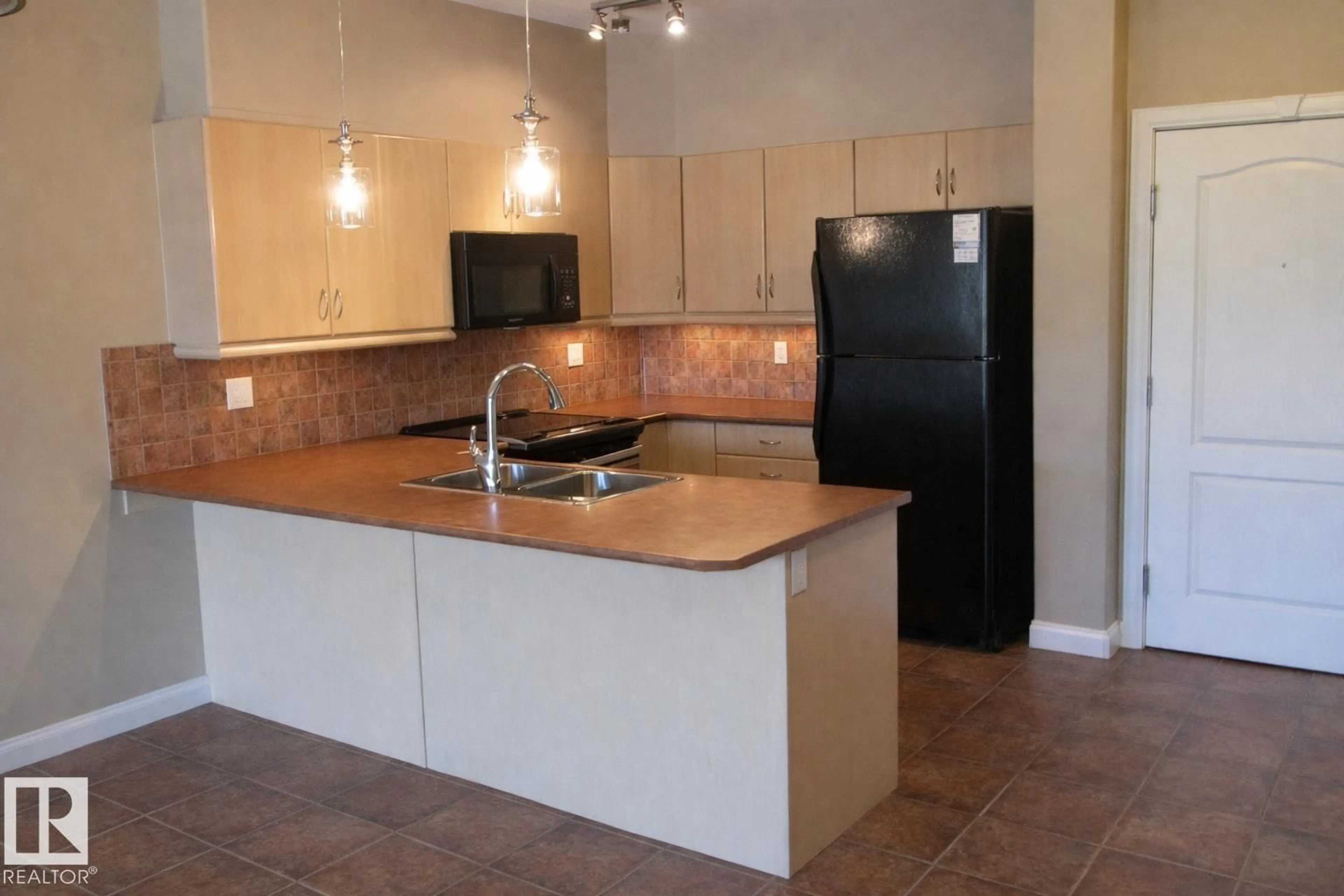 Standard kitchen, ceramic/tile floor for 310 - 1406 HODGSON WAY NW, Edmonton Alberta T6R3N1
