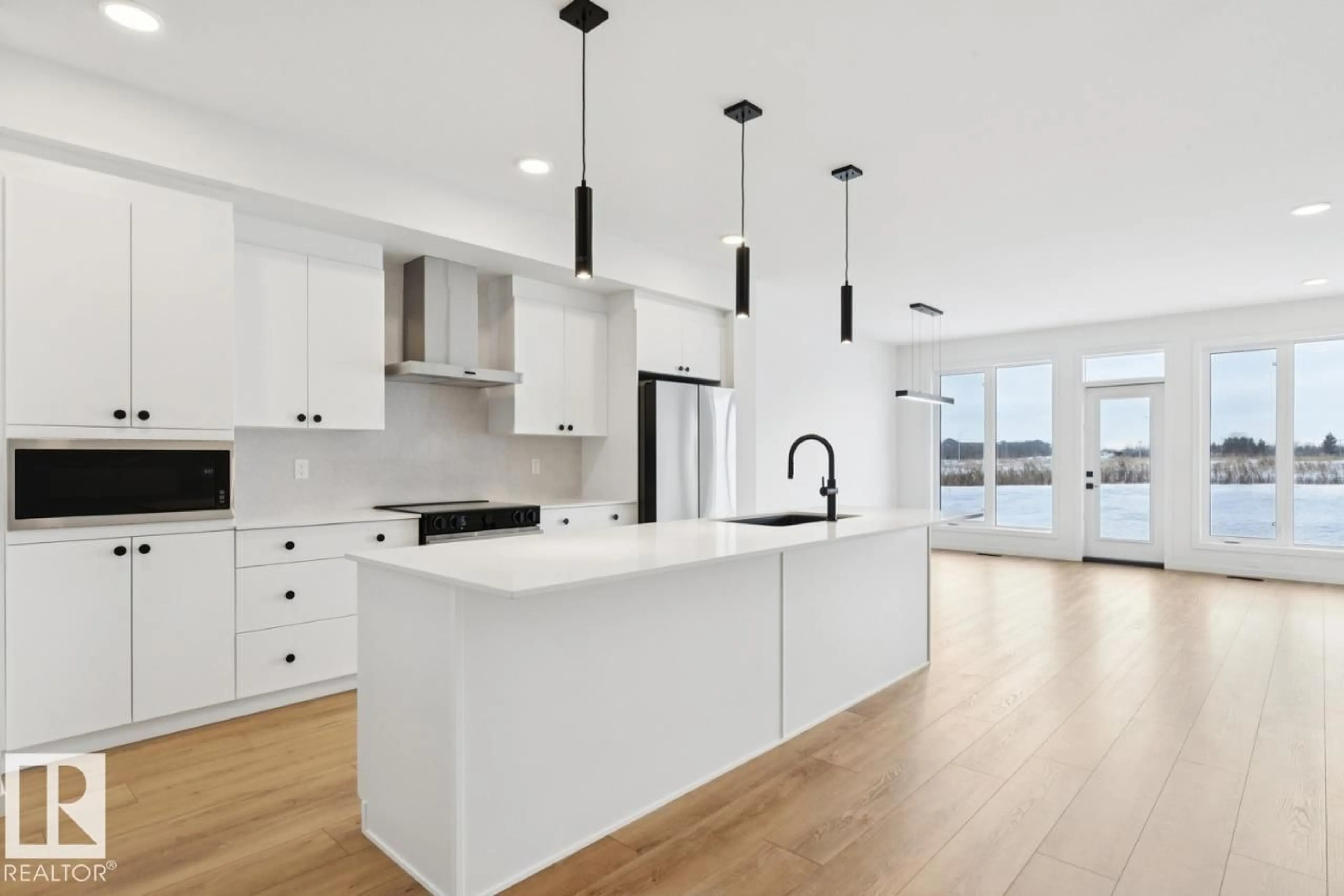 Open concept kitchen, unknown for 22923 80 AV, Edmonton Alberta T5T5X7