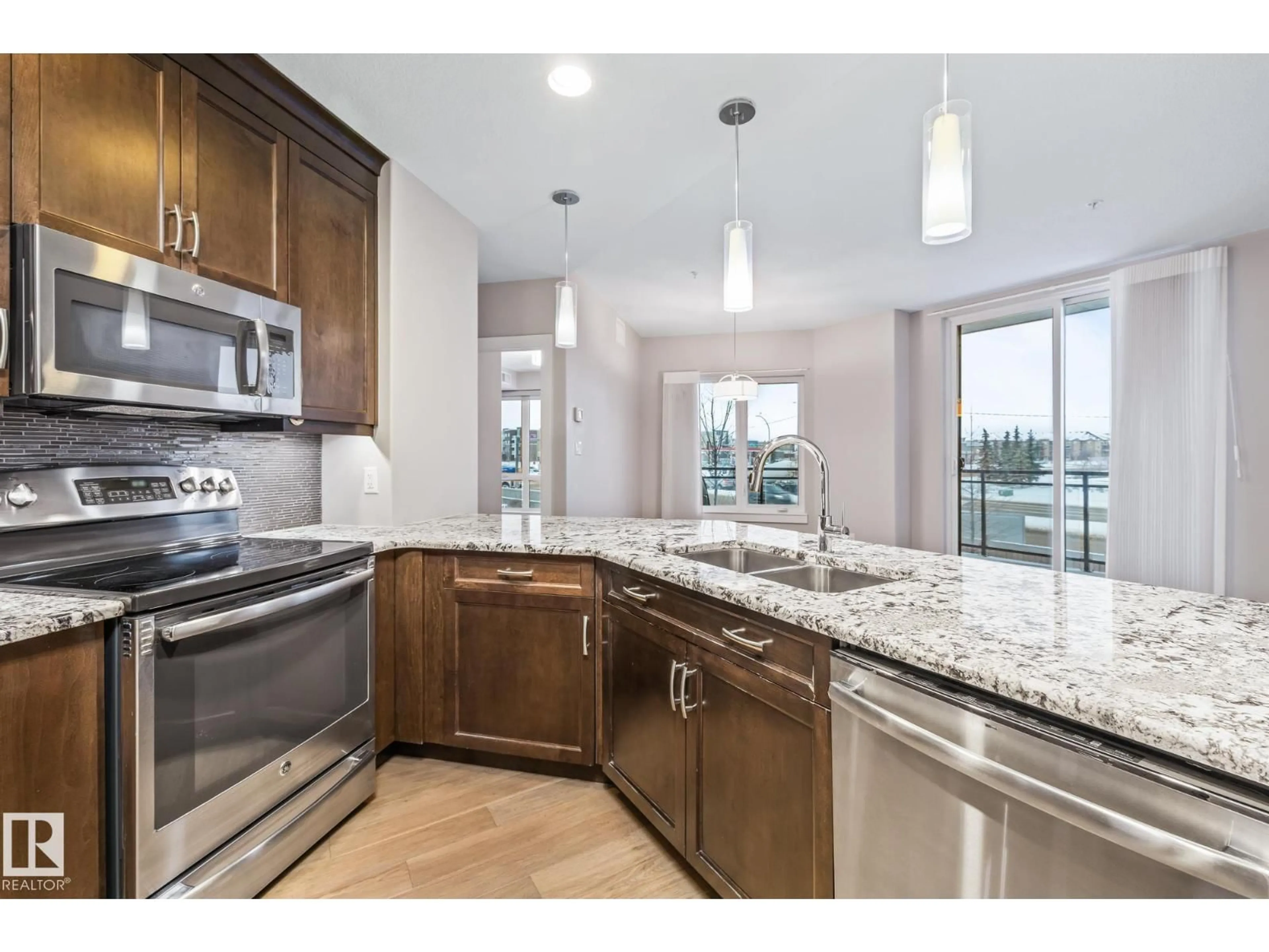 Open concept kitchen, ceramic/tile floor for #211 - 11080 ELLERSLIE RD, Edmonton Alberta T6W2C2