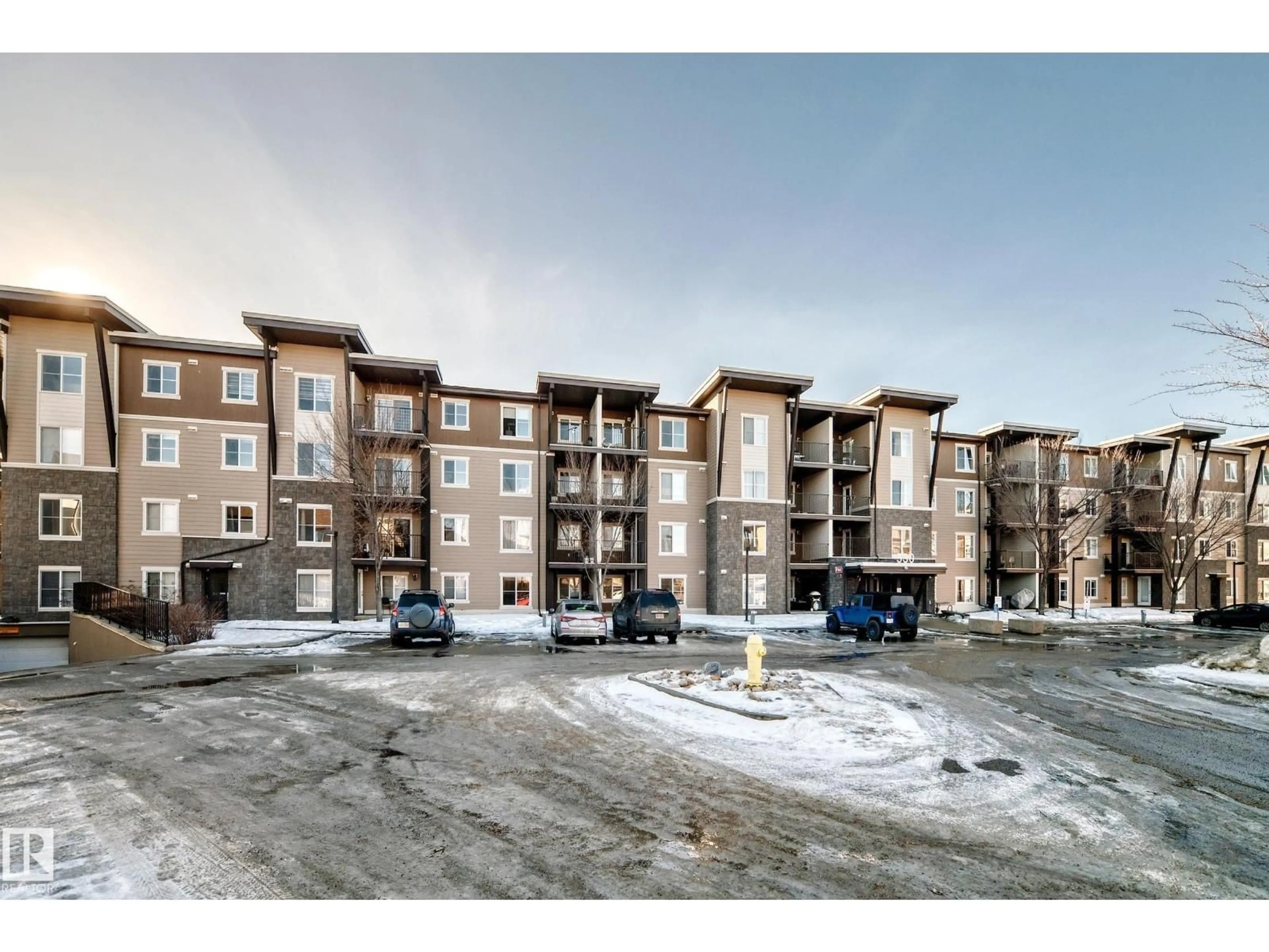 A pic from outside/outdoor area/front of a property/back of a property/a pic from drone, building for #302 - 530 WATT BV, Edmonton Alberta T6X1P7