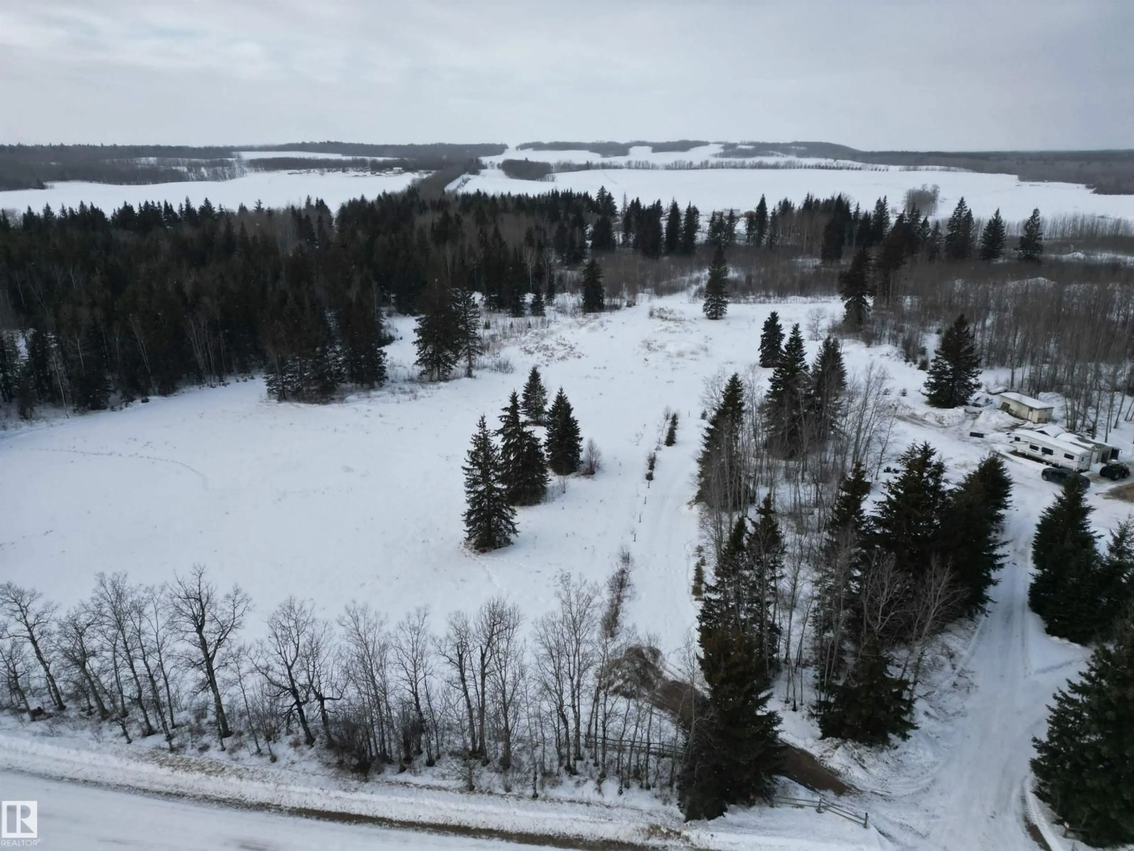 A pic from outside/outdoor area/front of a property/back of a property/a pic from drone, water/lake/river/ocean view for 60104 RGE ROAD 240A, Rural Westlock County Alberta T0G0P0