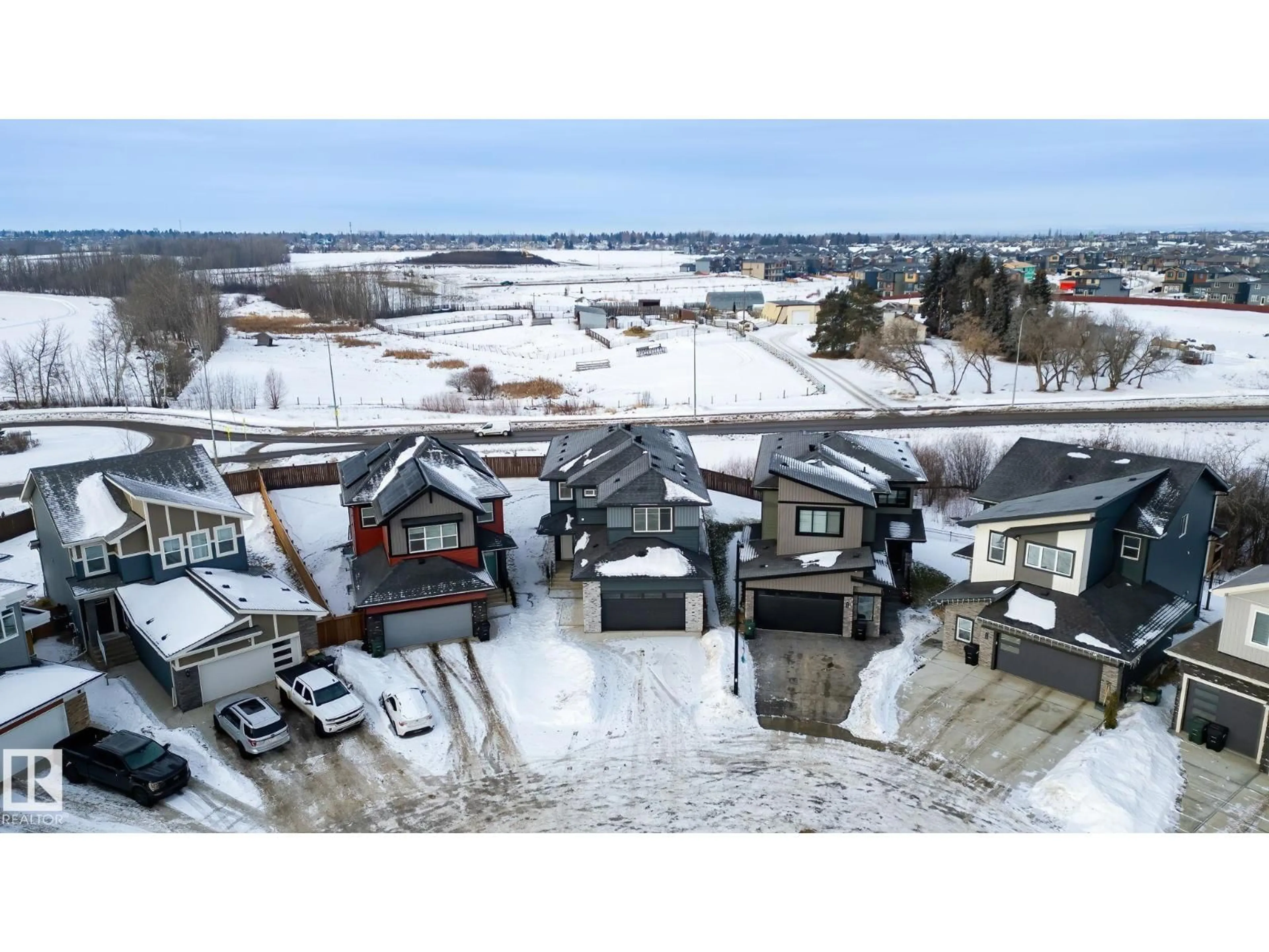 A pic from outside/outdoor area/front of a property/back of a property/a pic from drone, mountain view for 9 ELWYCK GA, Spruce Grove Alberta T7X0Z2
