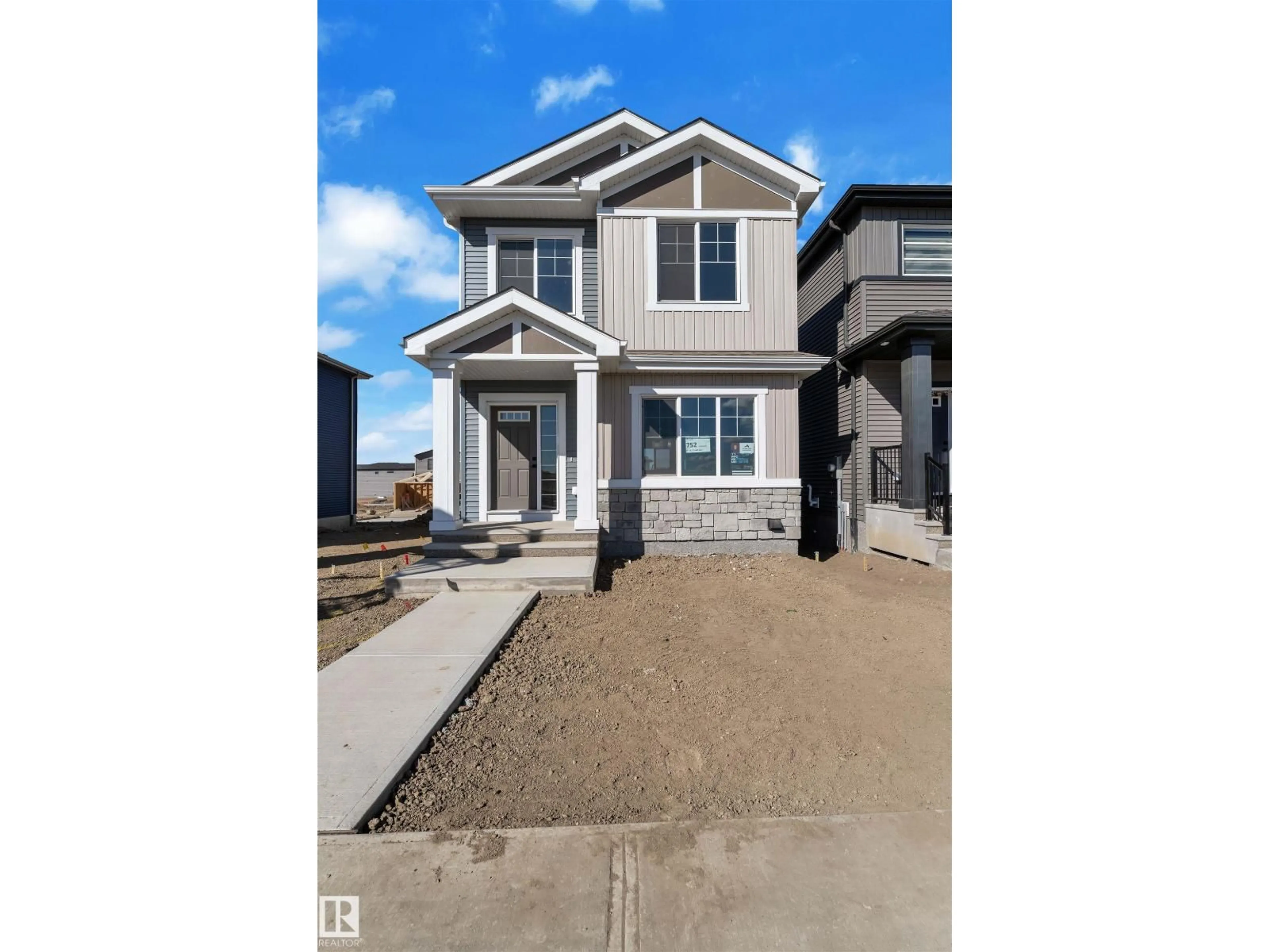 Home with vinyl exterior material, street for 752 MATTSON DR, Edmonton Alberta T6X1A3