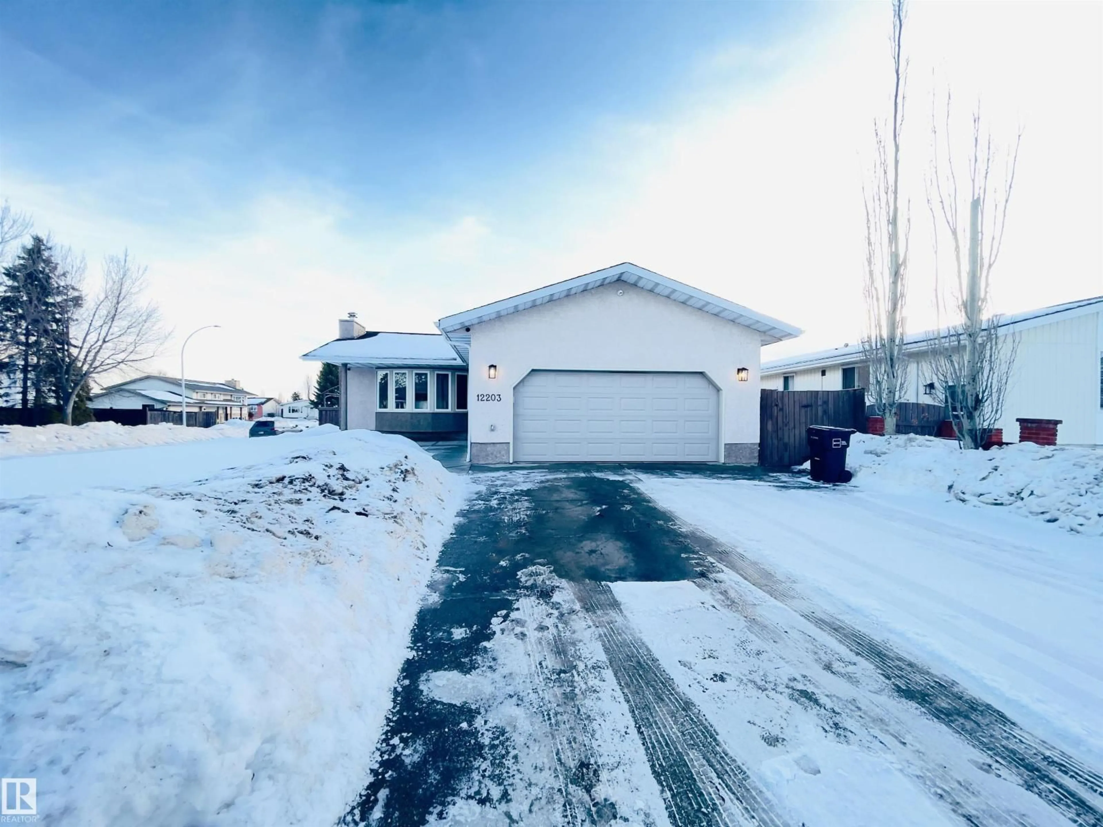 A pic from outside/outdoor area/front of a property/back of a property/a pic from drone, street for 12203 147 AV, Edmonton Alberta T5X1V4
