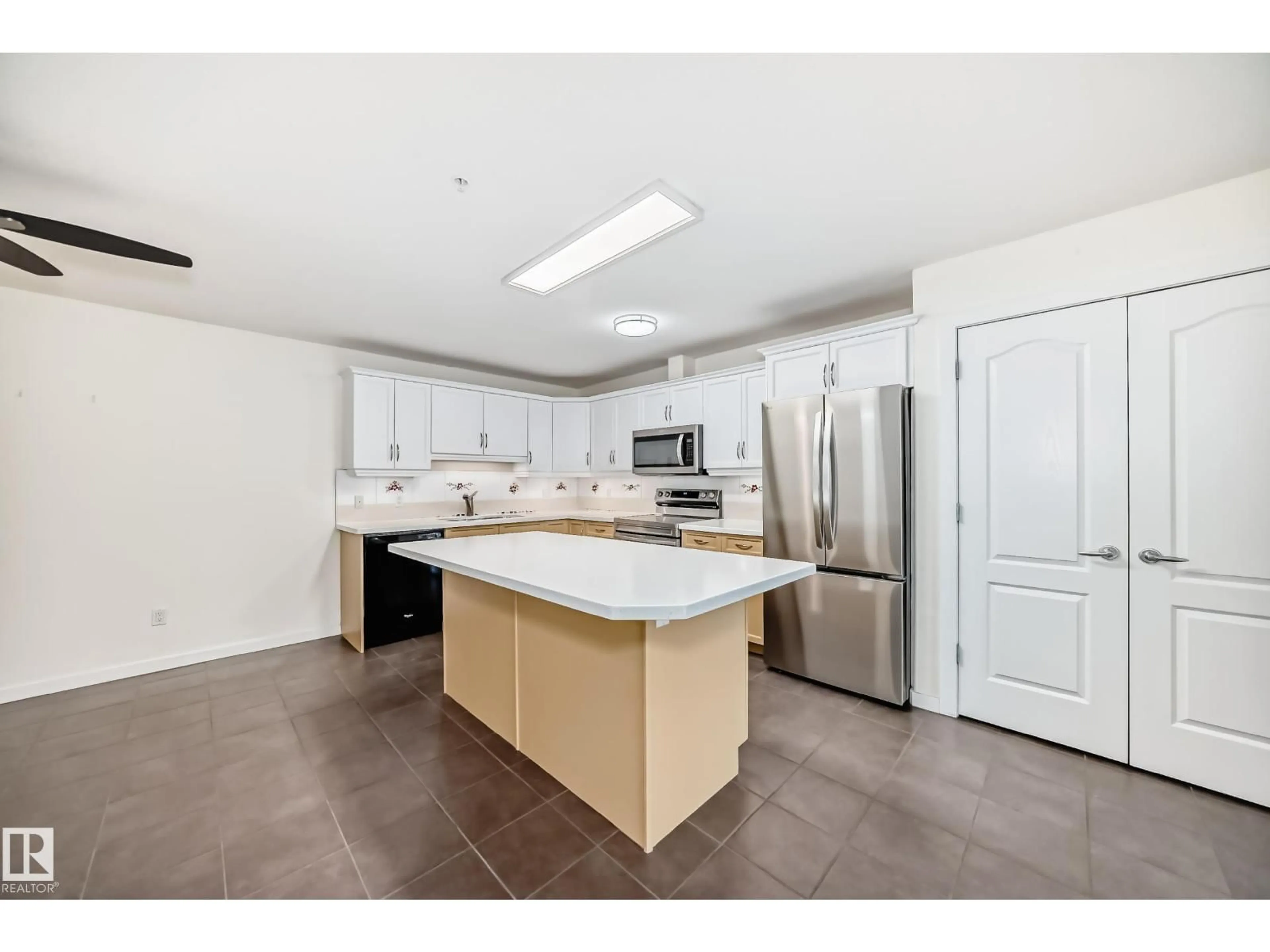 Open concept kitchen, ceramic/tile floor for 125 278 SUDER GREENS DR NW, Edmonton Alberta T5T6V6
