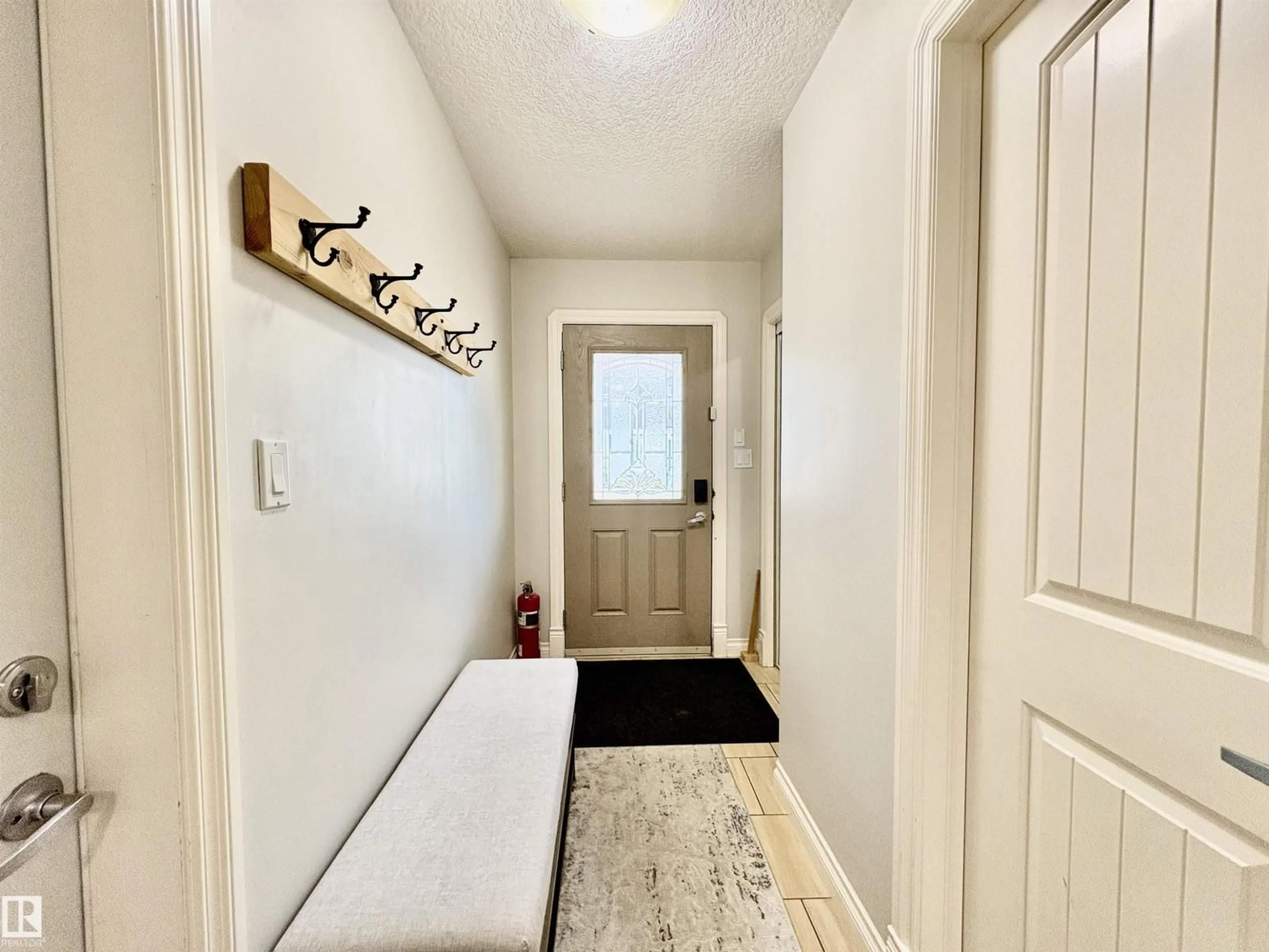 Indoor entryway for 14907 109 AV, Edmonton Alberta T5P1M5